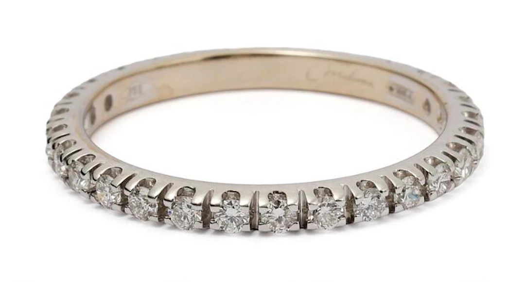 A diamond ring set with numerous diamonds mounted in 18k white gold.