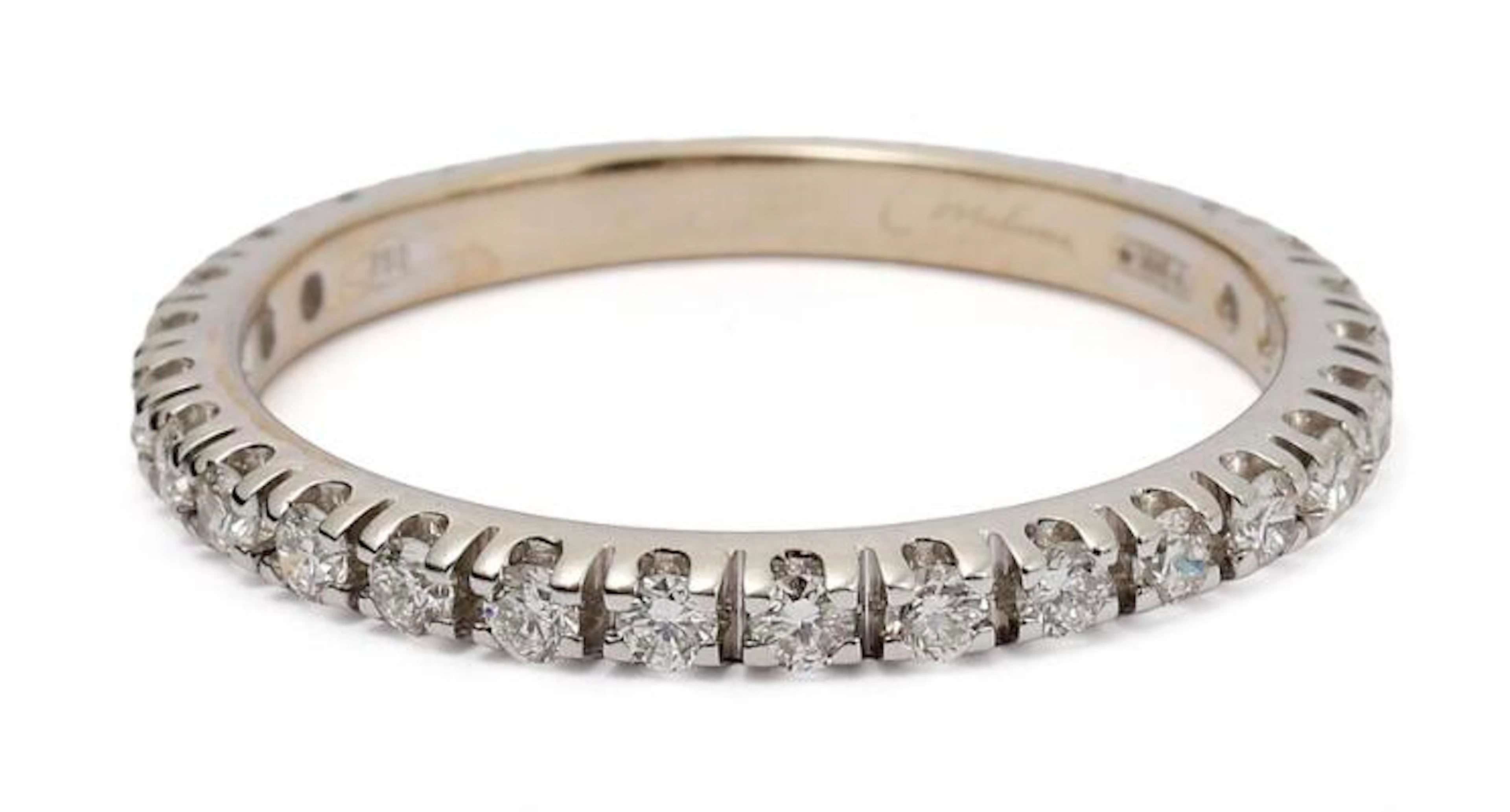 A diamond ring set with numerous diamonds mounted in 18k white gold.