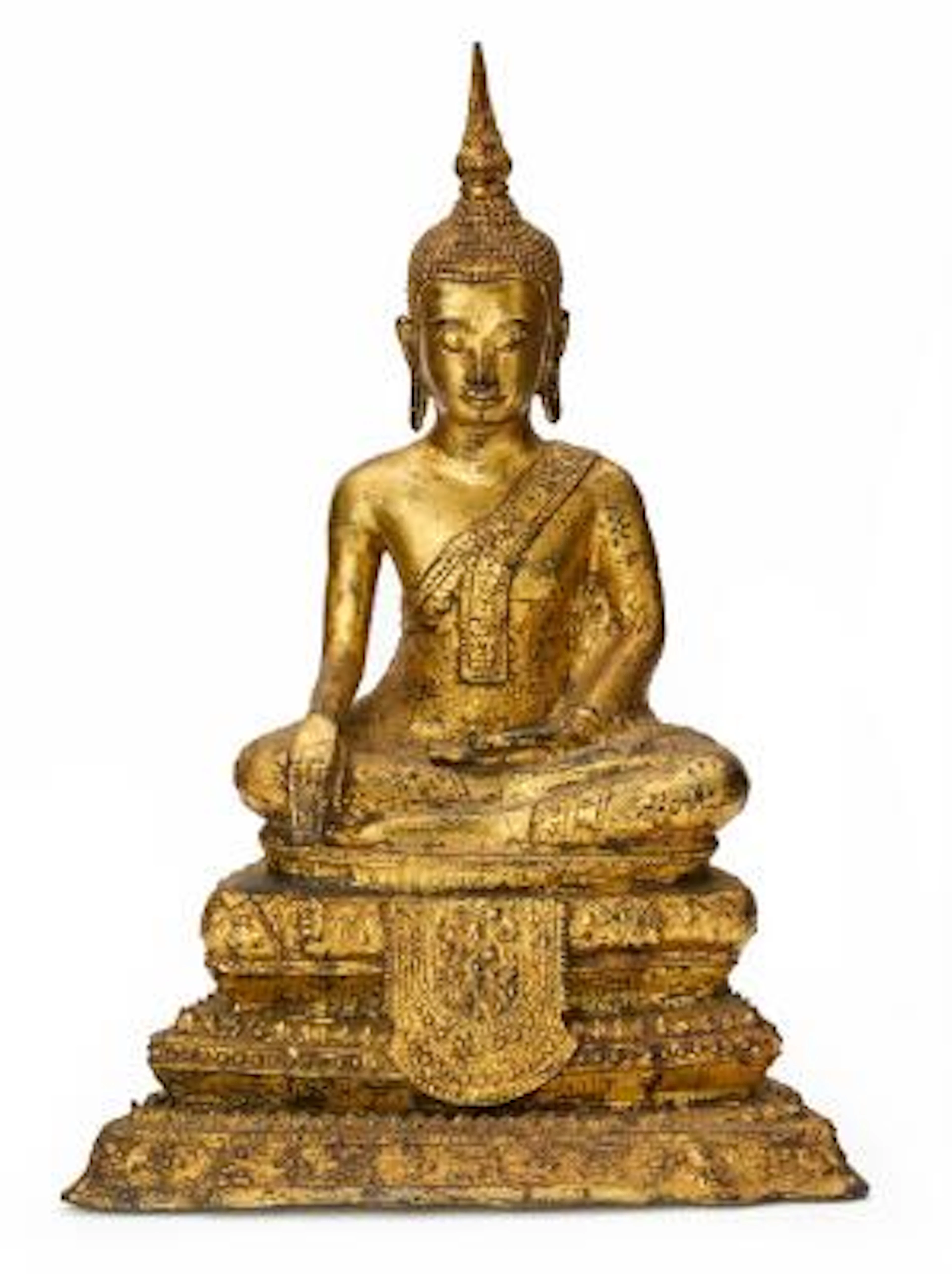 A gilt bronze Buddha seated in meditative pose on a throne. Thailand