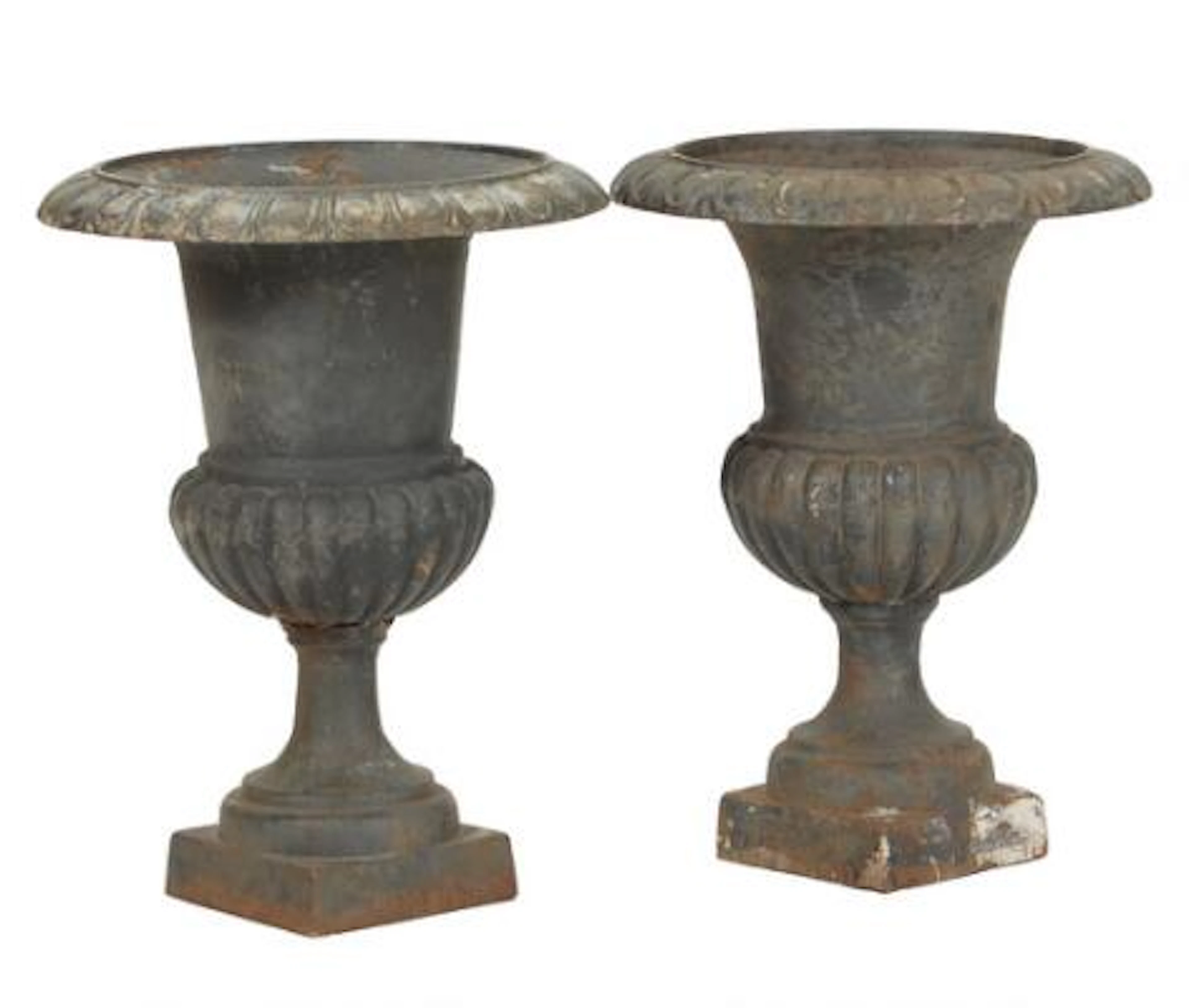 A pair of classical partly painted cast iron garden vases, cast with