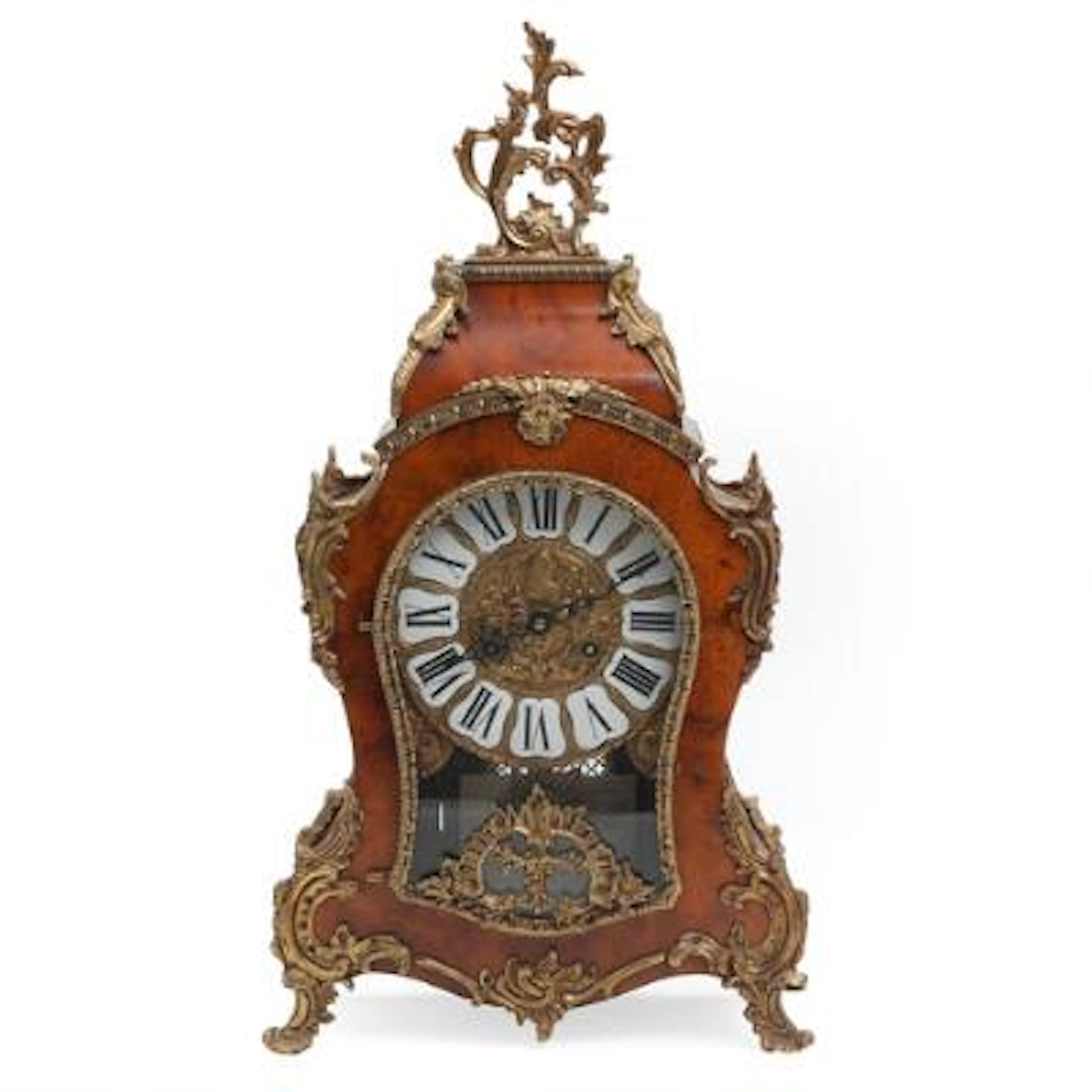 A German Rococo style mantel clock in burr wood case with bronze mounts.