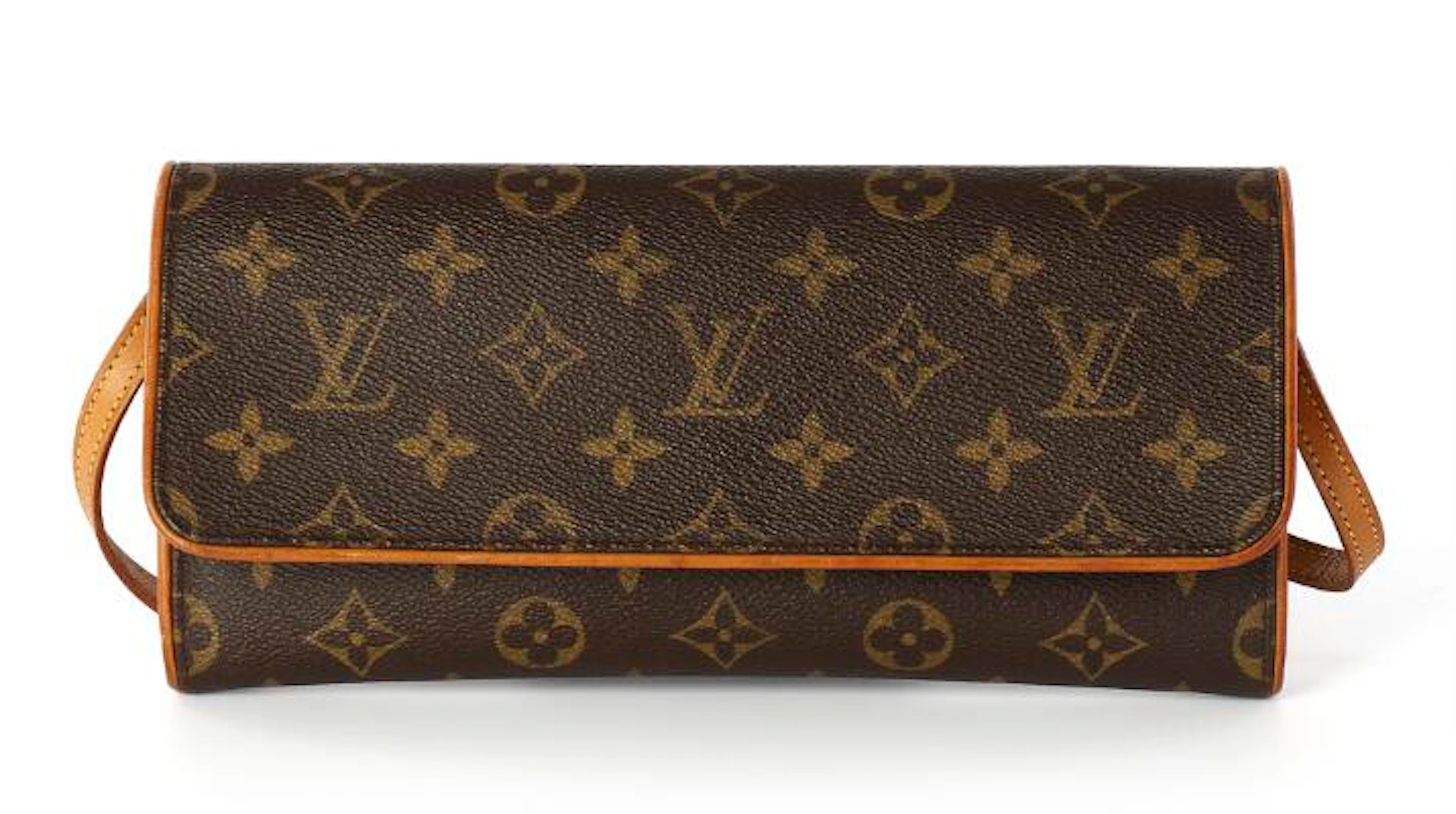 Louis Vuitton: A "Pochette Twin" clutch/bag of brown monogram canvas