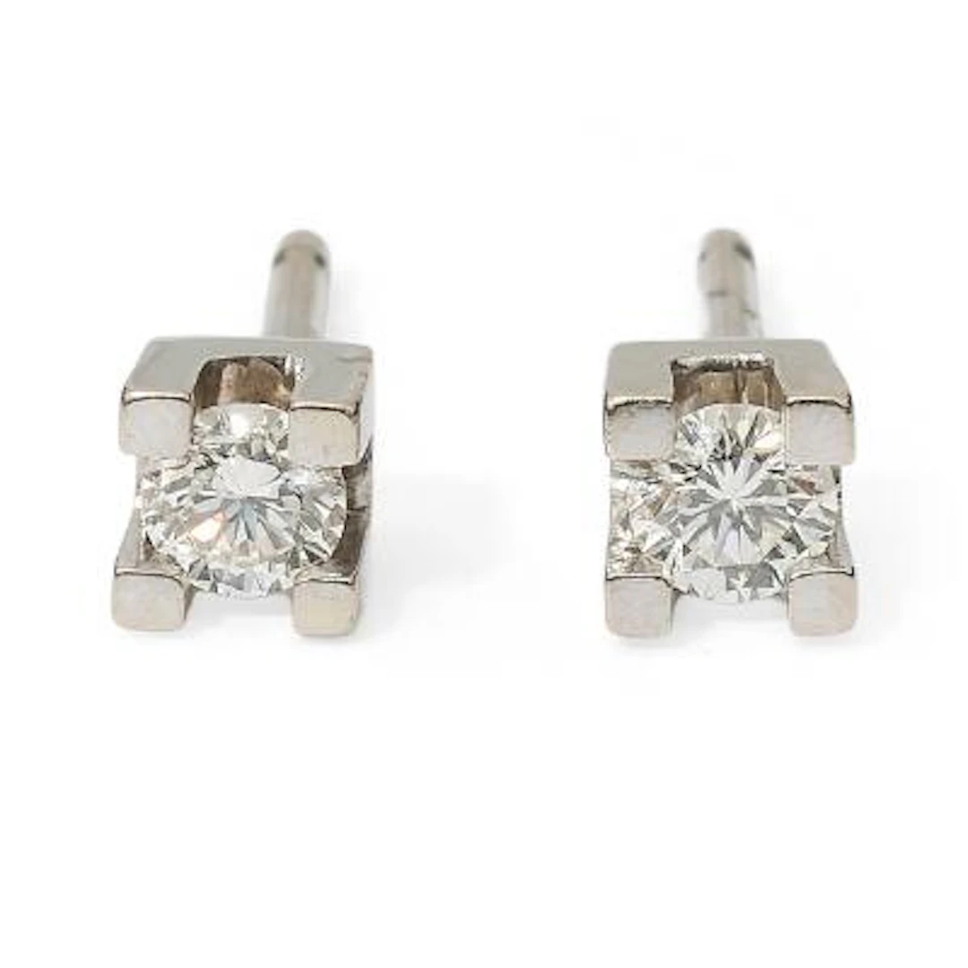 A pair of diamond ear studs each set with a brilliant-cut diamond