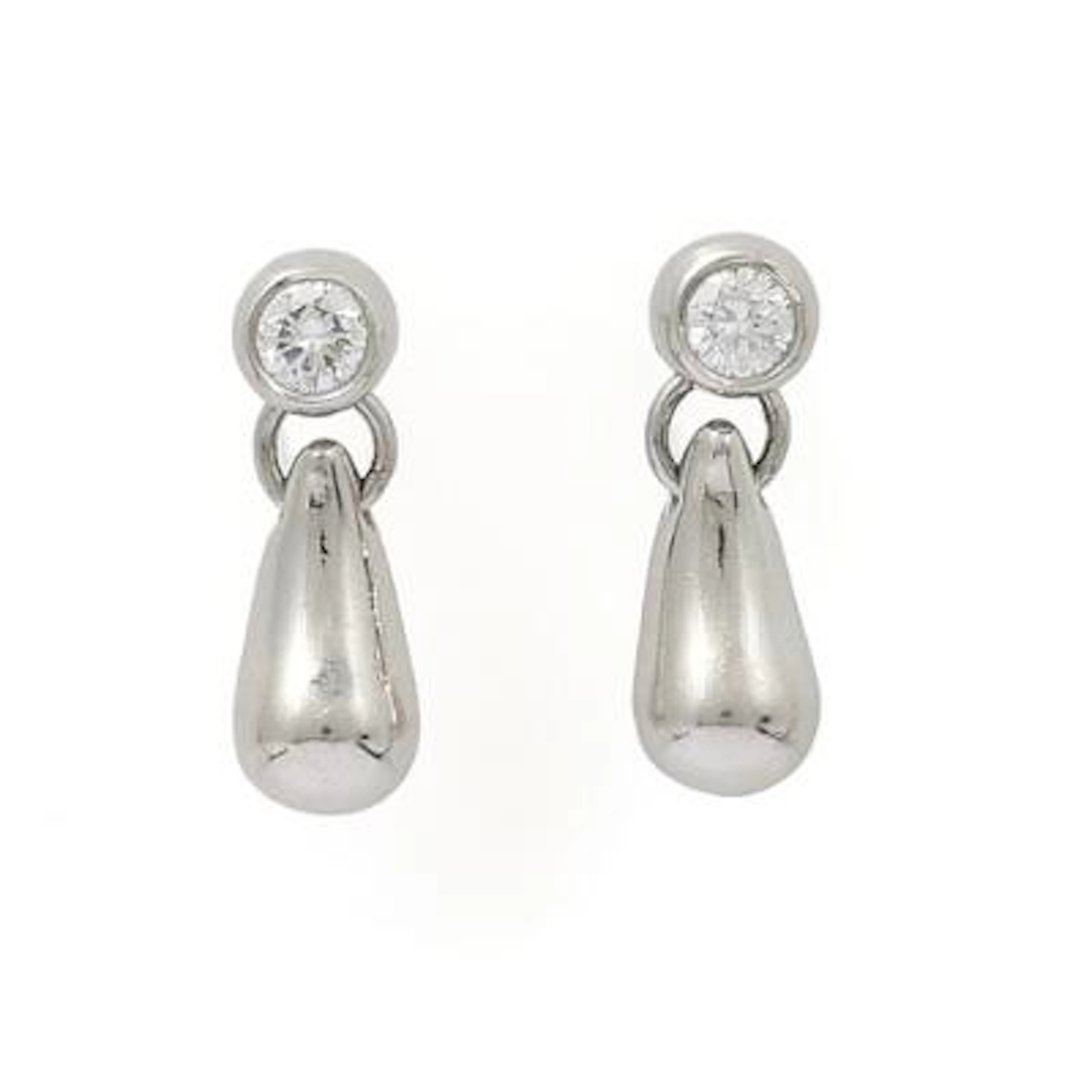 Tiffany & Co.: A pair of "Teardrop" ear pendants each set with a brilliant-cut
