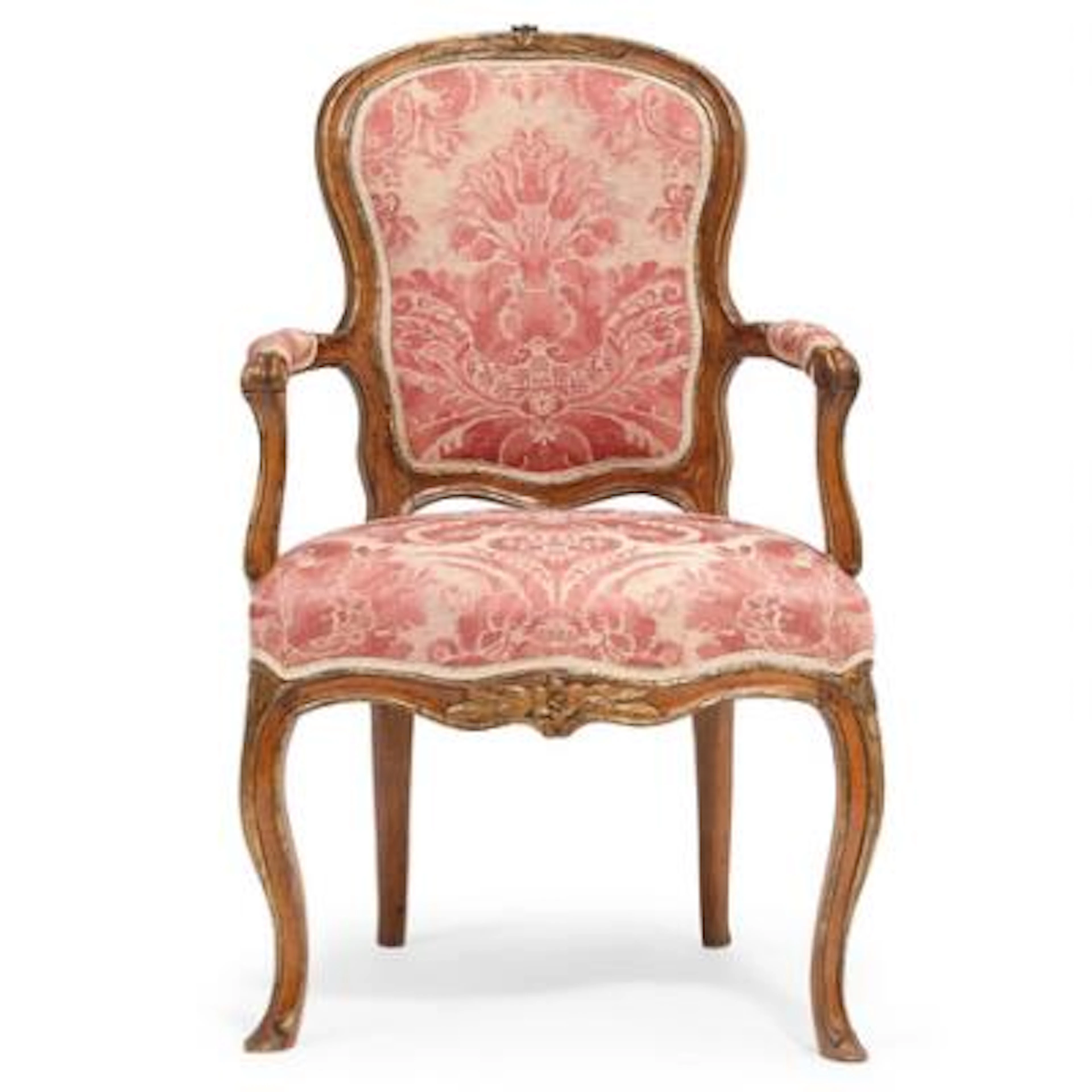 A Danish mid 18th century Rococo partly gilt beech armchair, carved