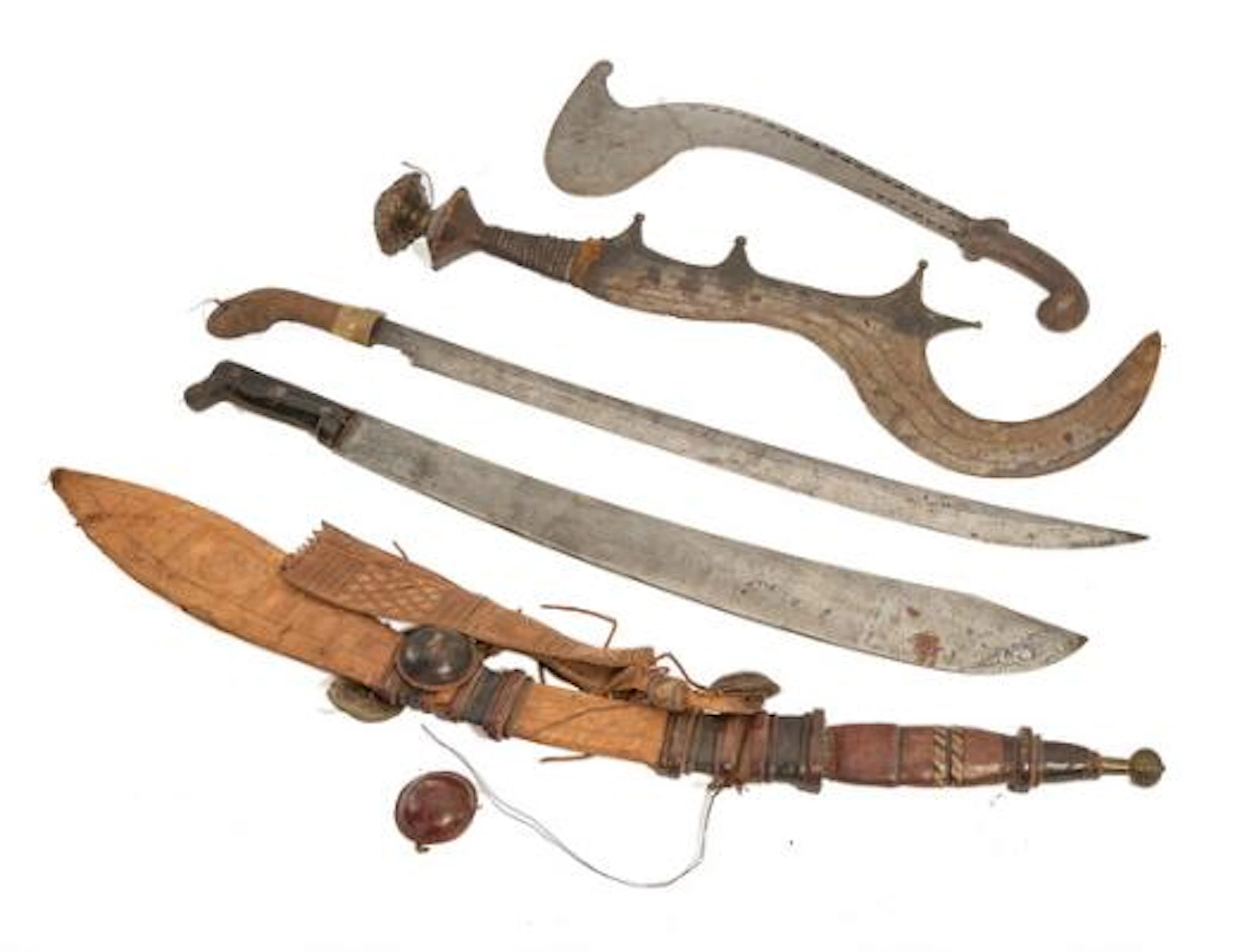 Four ethnographic edged weapons and a machete. – Bruun Rasmussen Auctioneers