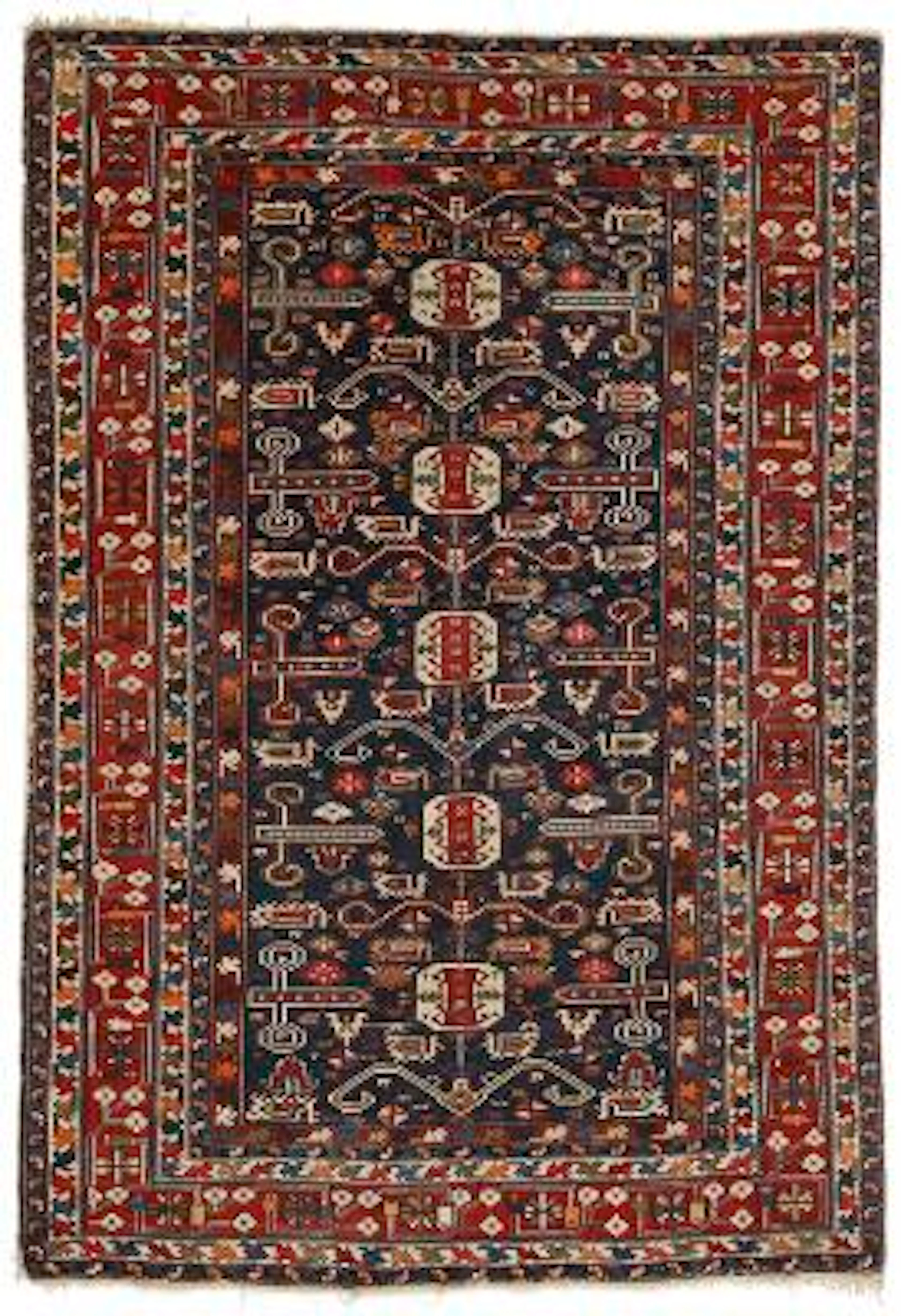 An antique Perepedil rug, Caucasus. Classical design with stylized