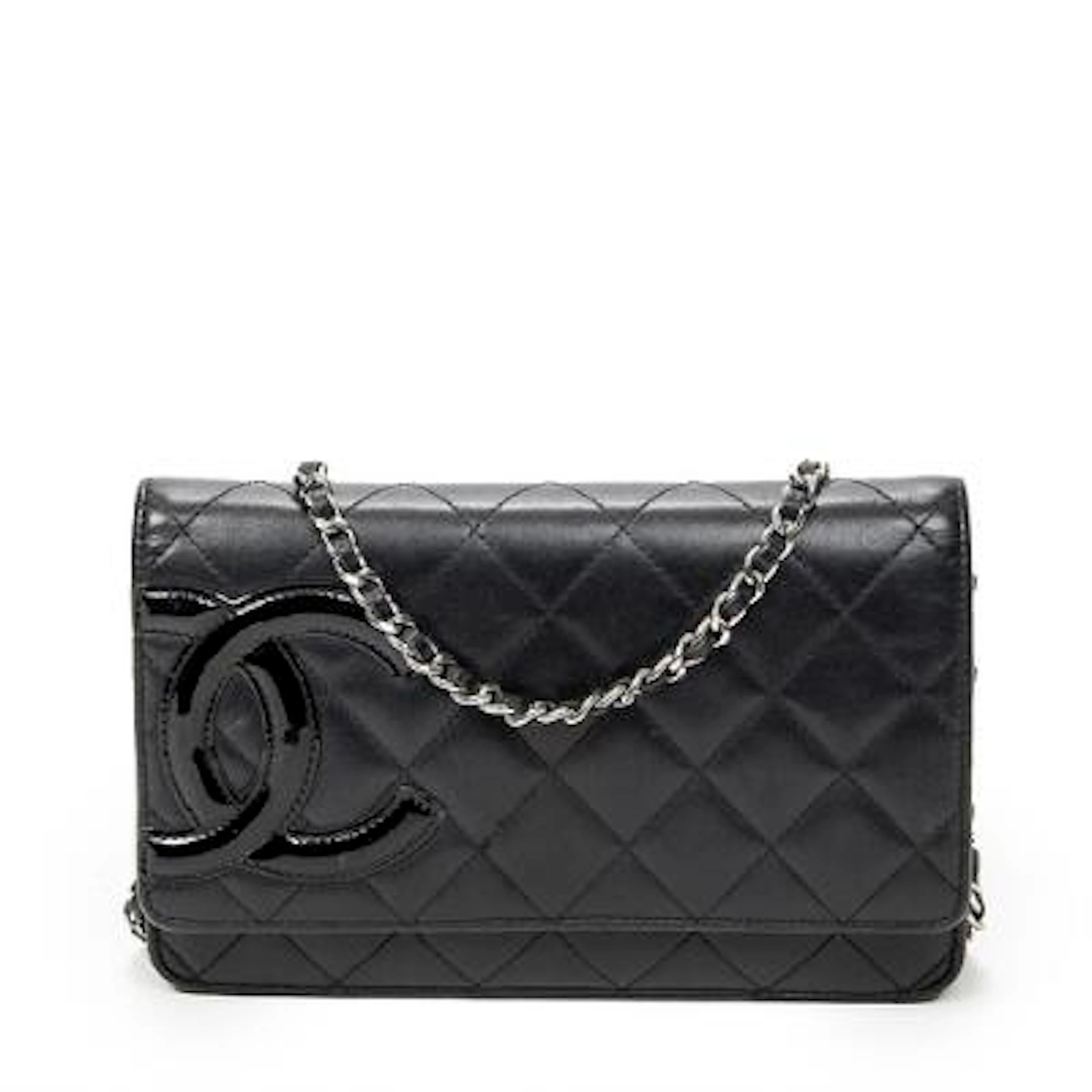 Chanel: A "Cambon Ligne" wallet on chain in black quilted leather