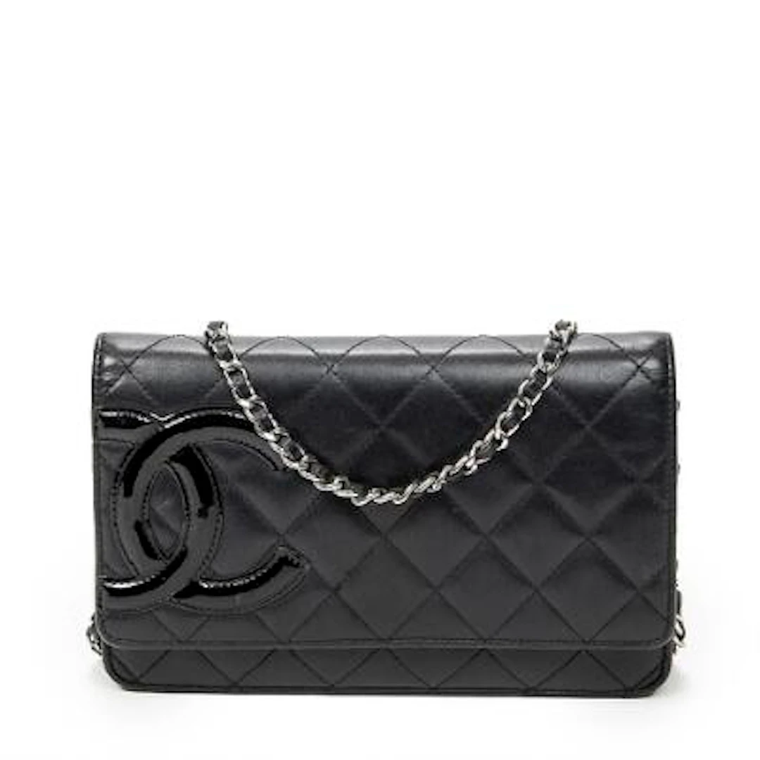 Chanel: A "Cambon Ligne" wallet on chain in black quilted leather