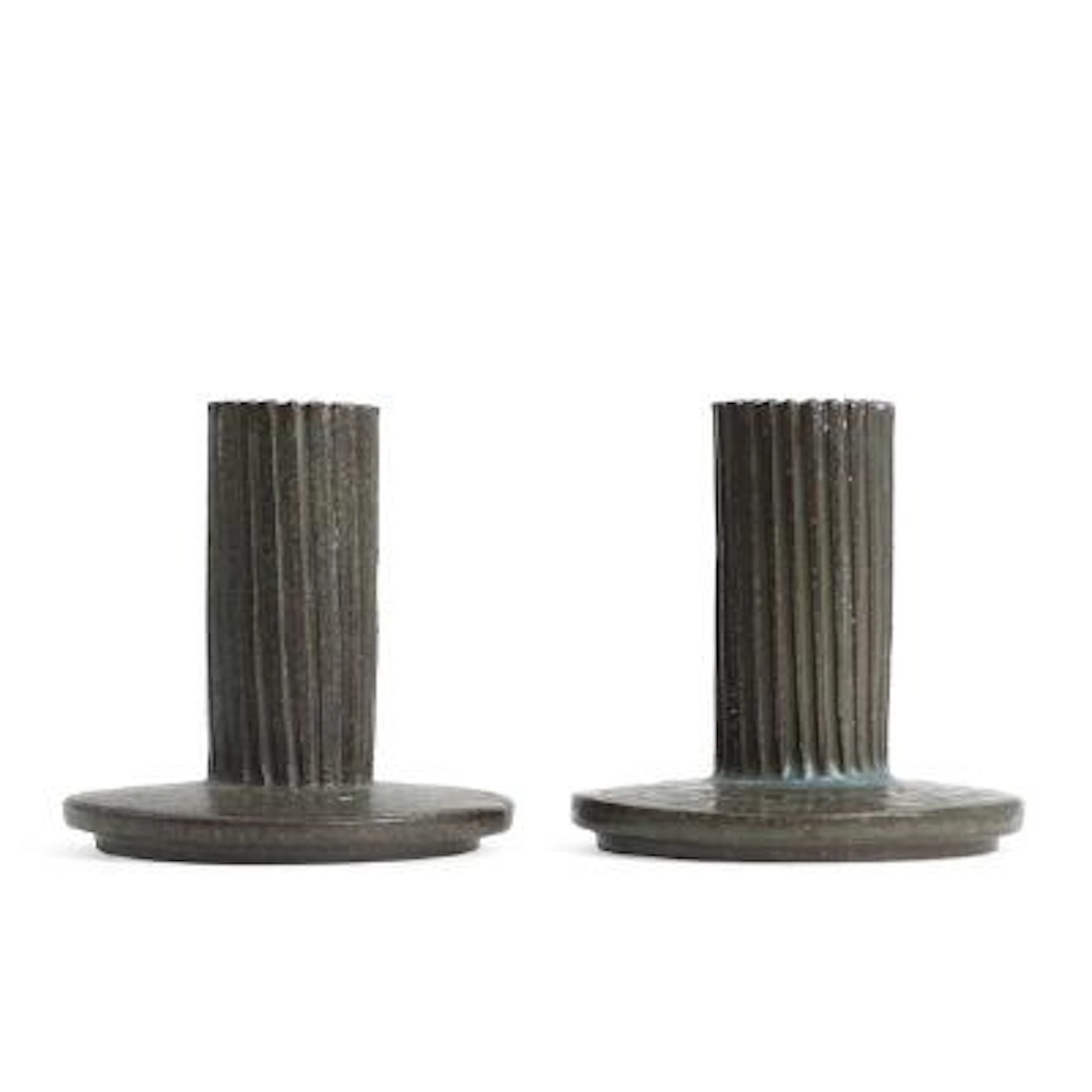 Arne Bang: A pair of stoneware candlesticks, decorated with blue-green