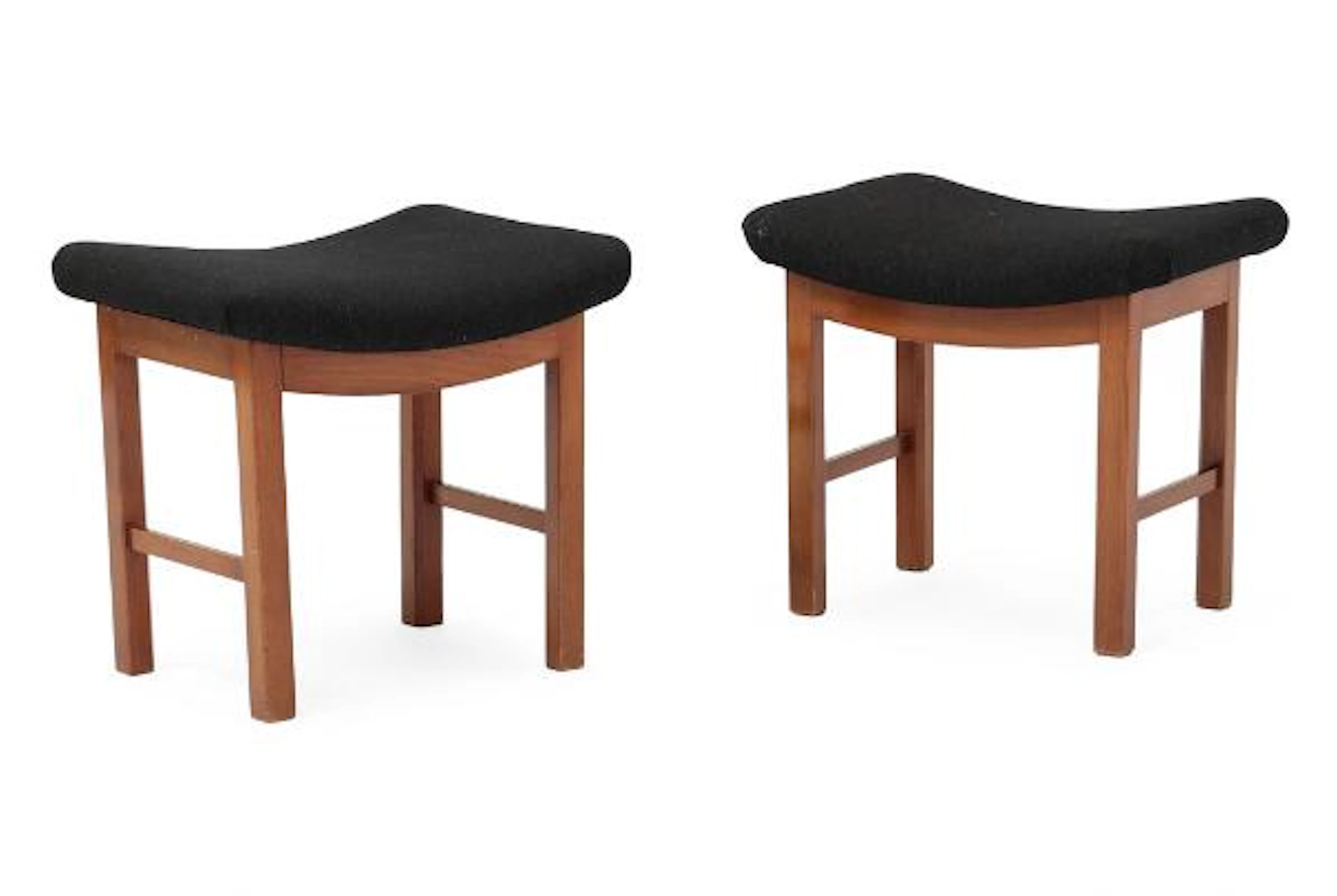 Fritz Hansen: A pair of stools with frame of stained beech. Seat upholstered