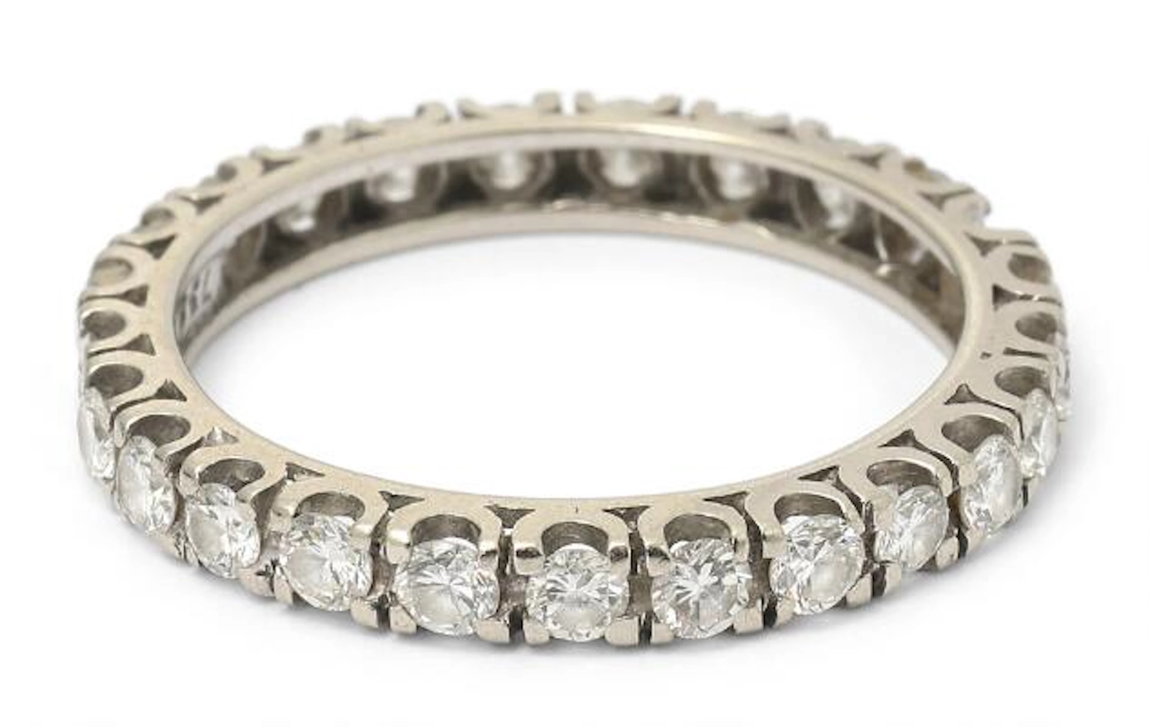 A diamond ring set with numerous brilliant-cut diamonds, mounted in
