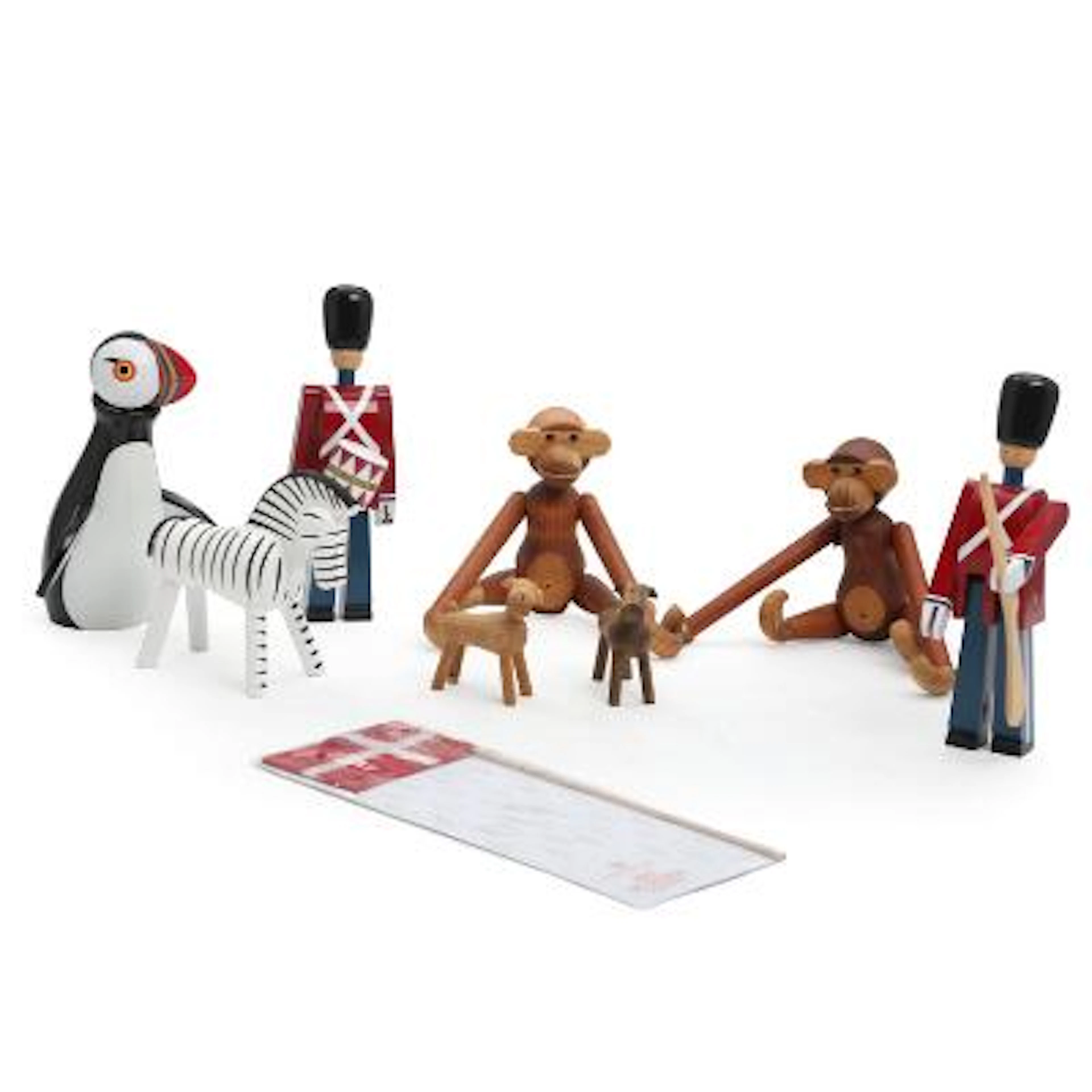 Kay Bojesen: Collection of painted wood, teak and oak figurines, comprising
