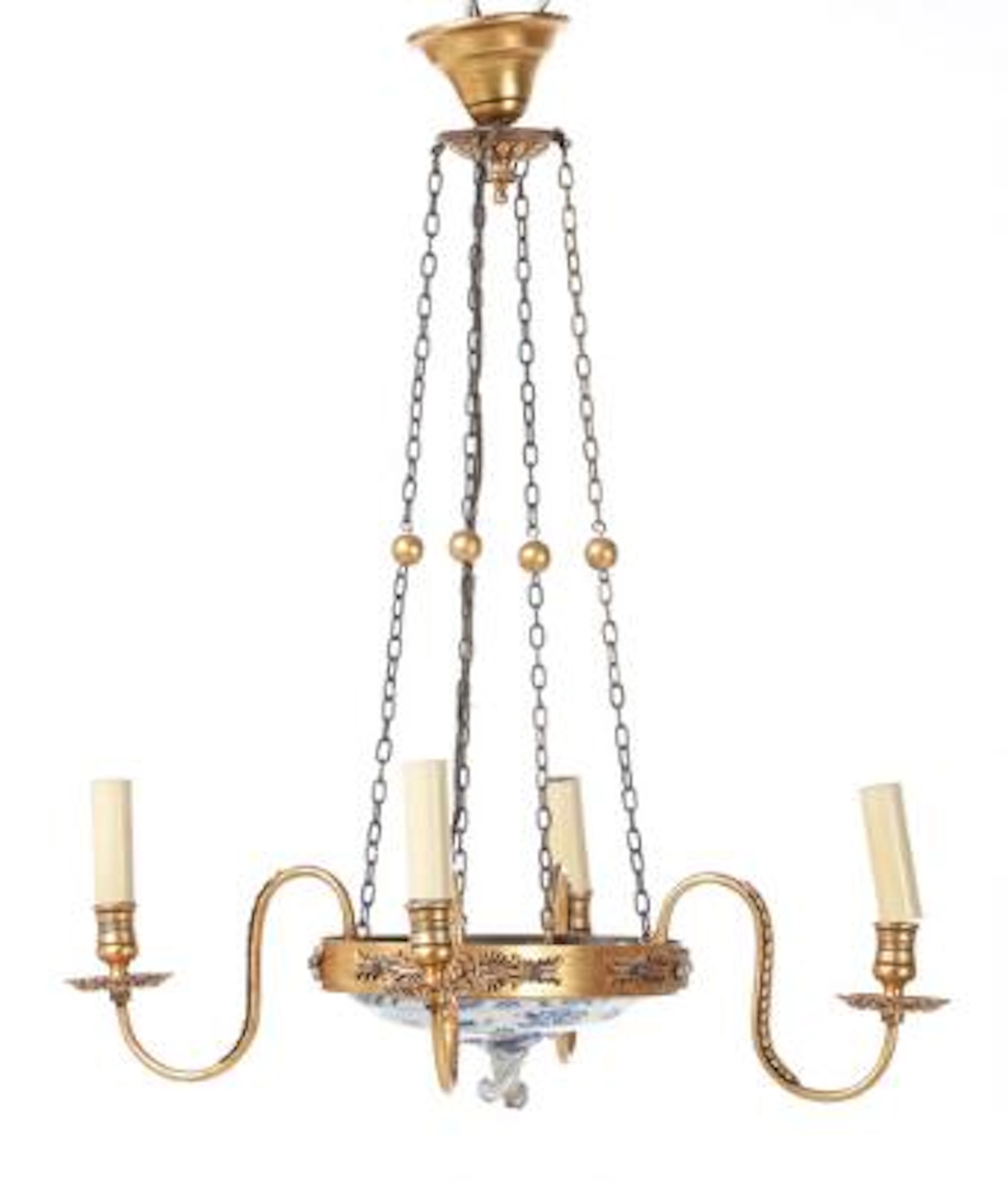 A circa 1900 gilt bronze chandelier with four curved light arms. H.