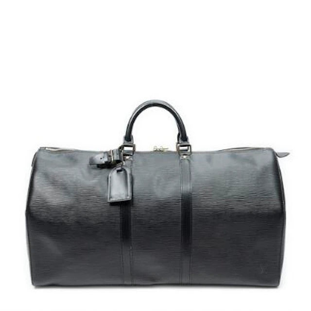 Louis Vuitton: A "Keepall 60" travel bag of black Epi leather with