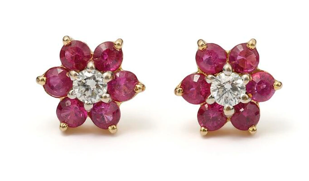 A pair of sapphire and diamond ear studs each with sapphires and a