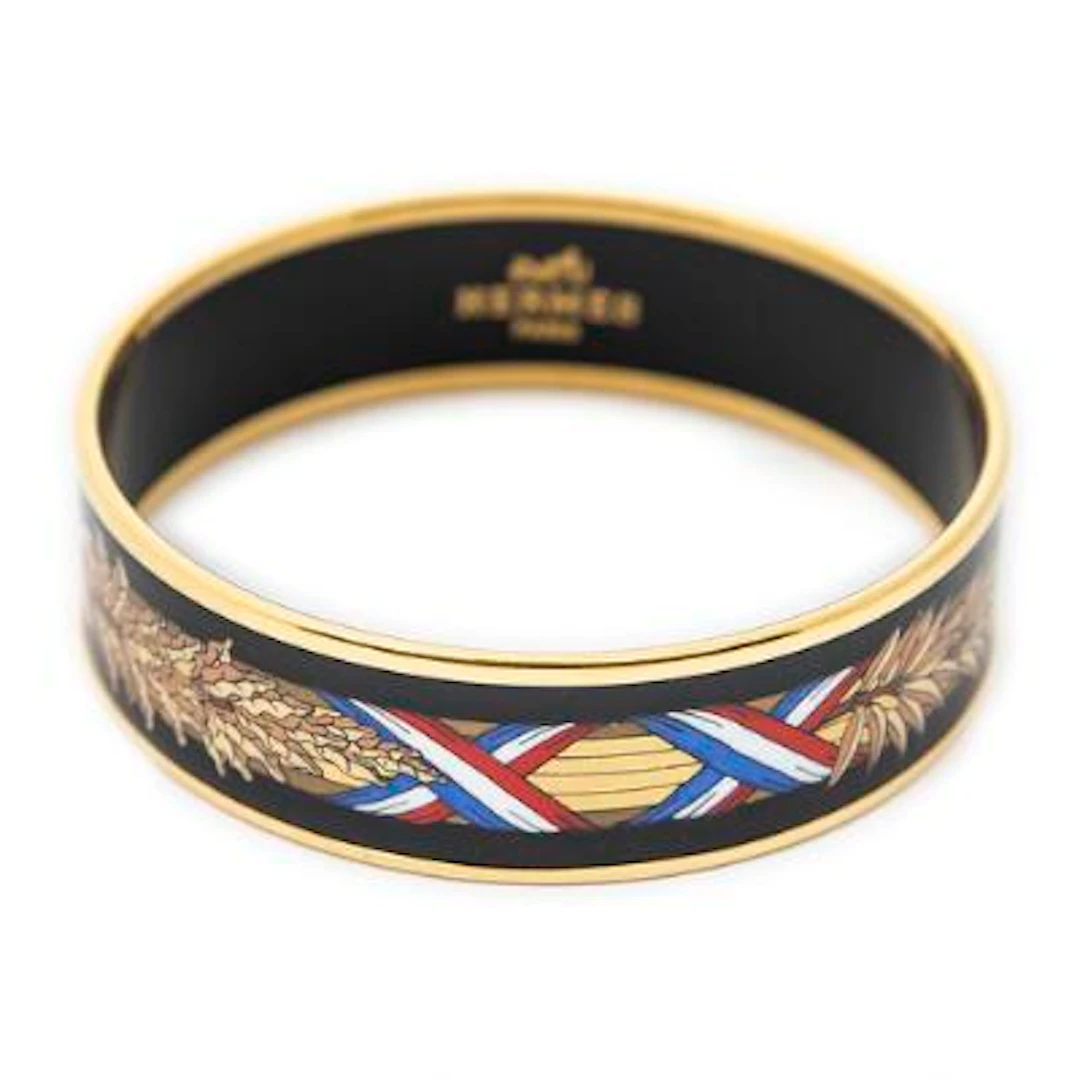 Hermès: A bangle set with multi-colour enamel motif, mounted in gold