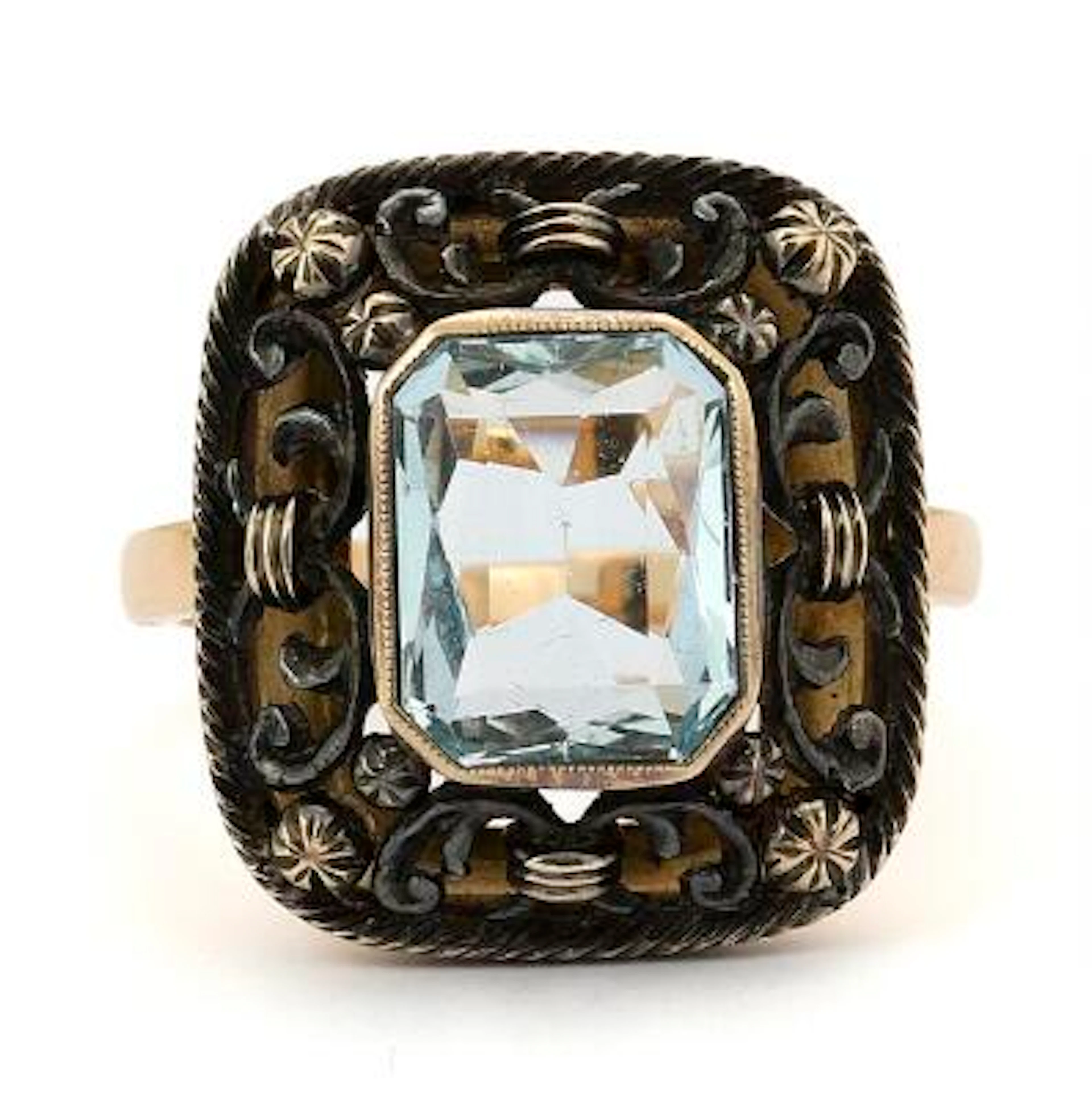 An aquamarine ring set with an aquamarine mounted in 18 gold. Size