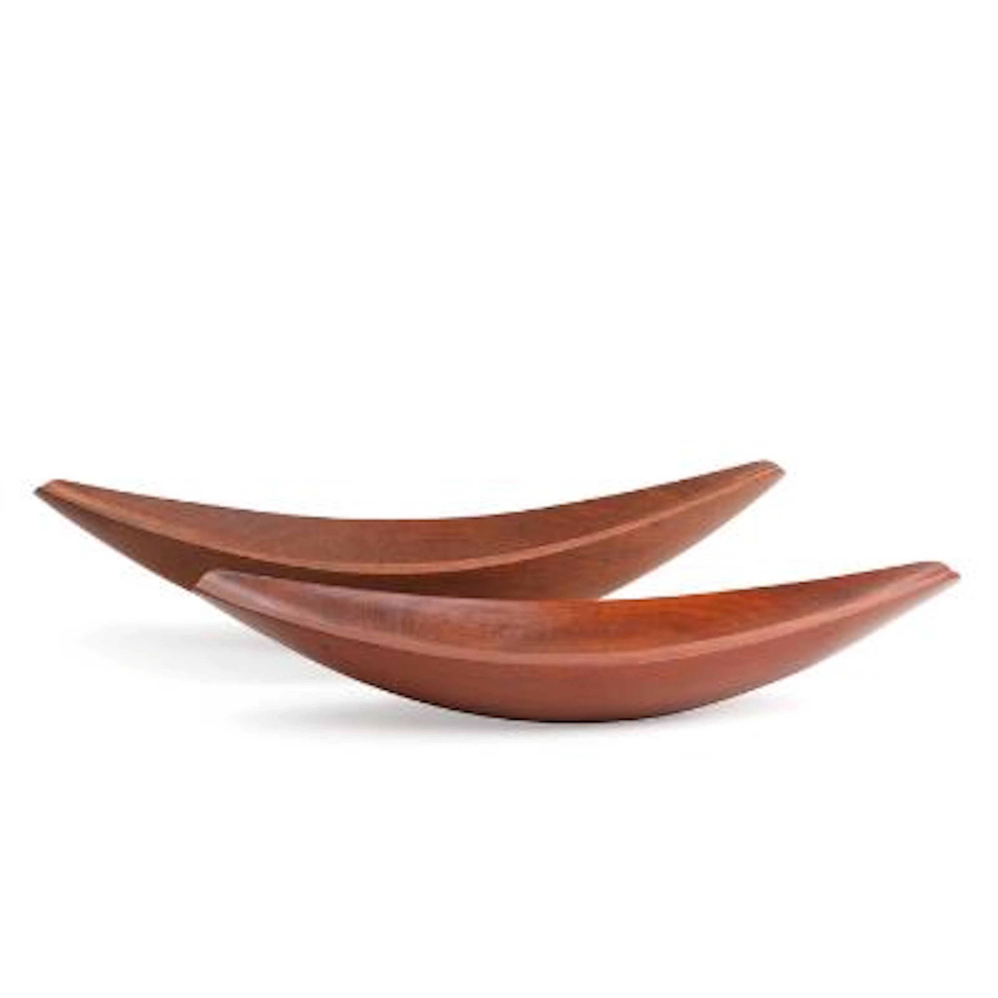 Jens H. Quistgaard: Two boat shaped solid teak serving dishes. Manufactured