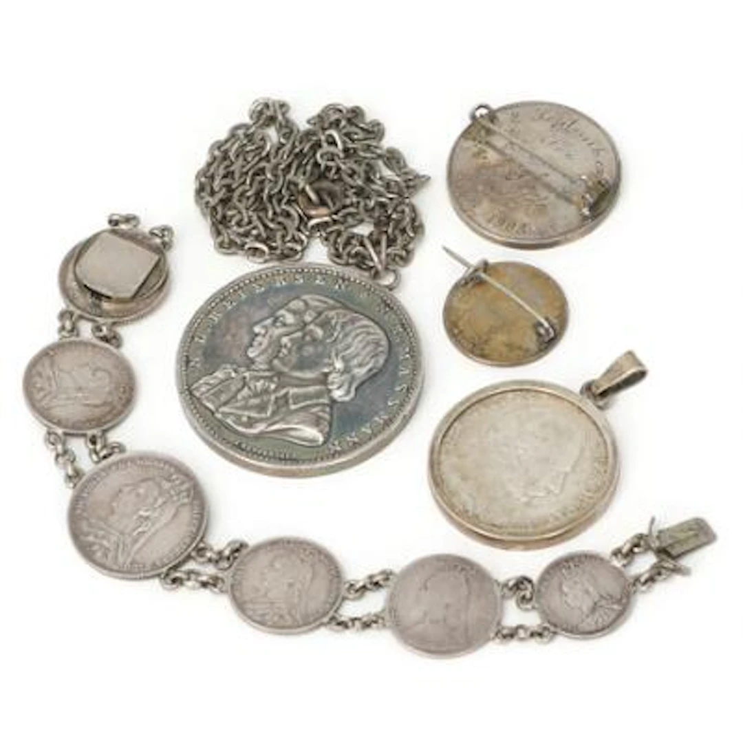 Lot cont various silver coins and medals converted into necklaces