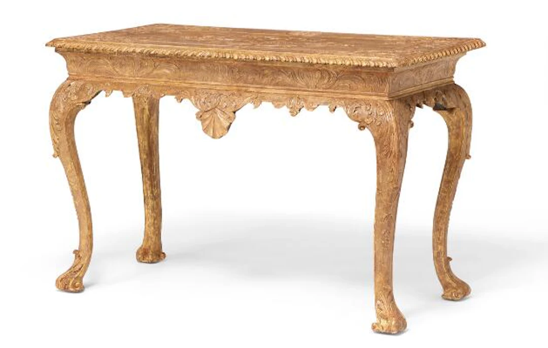 A pair of George I giltwood and gilt gesso side table. C. 1715-1720.