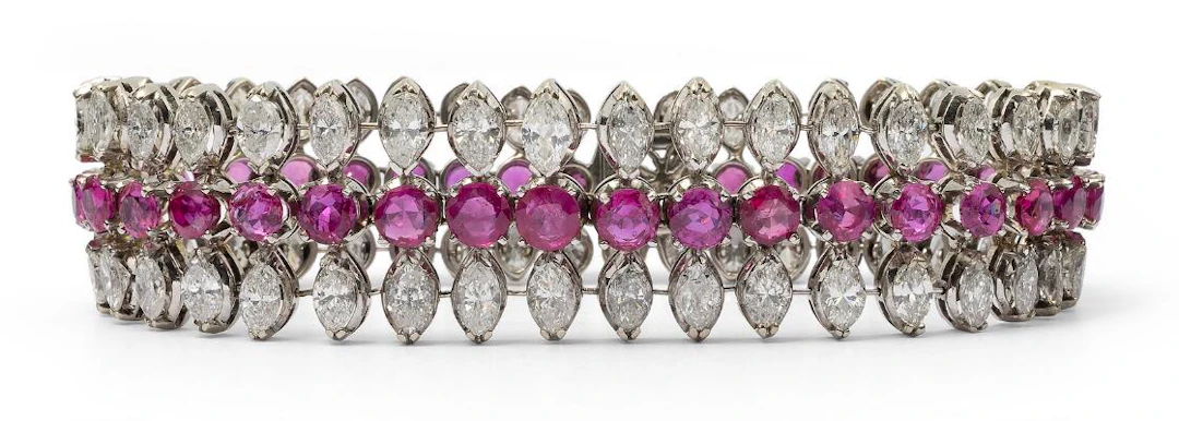 A ruby and diamond bracelet set with numerous rubies and diamonds