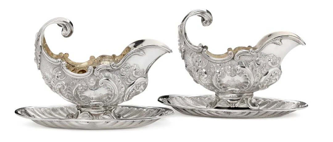 A. Michelsen: Two identical Danish Rococo Revival silver sauce boats