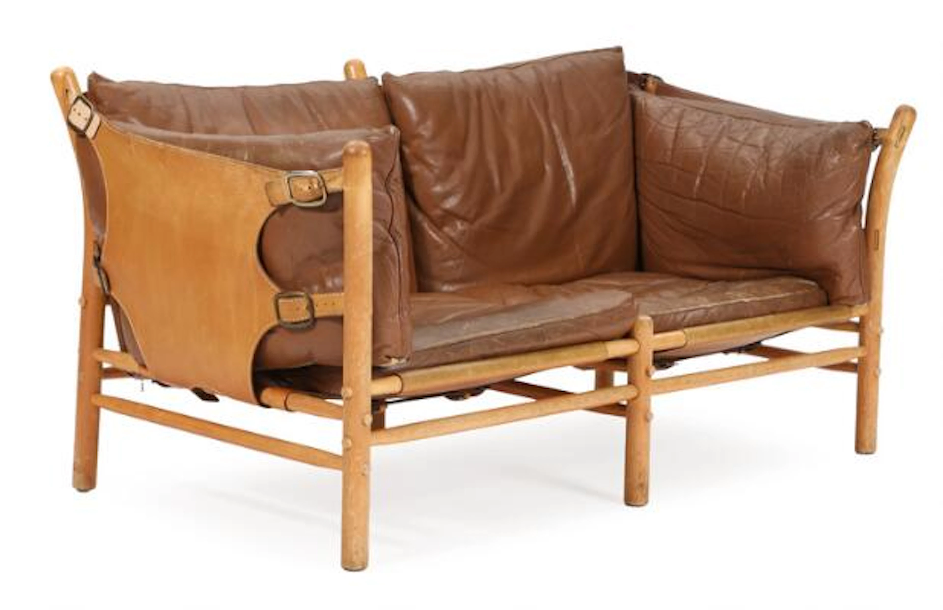 Arne Norell: "Ilona". A two-seated beech sofa with sides stretched