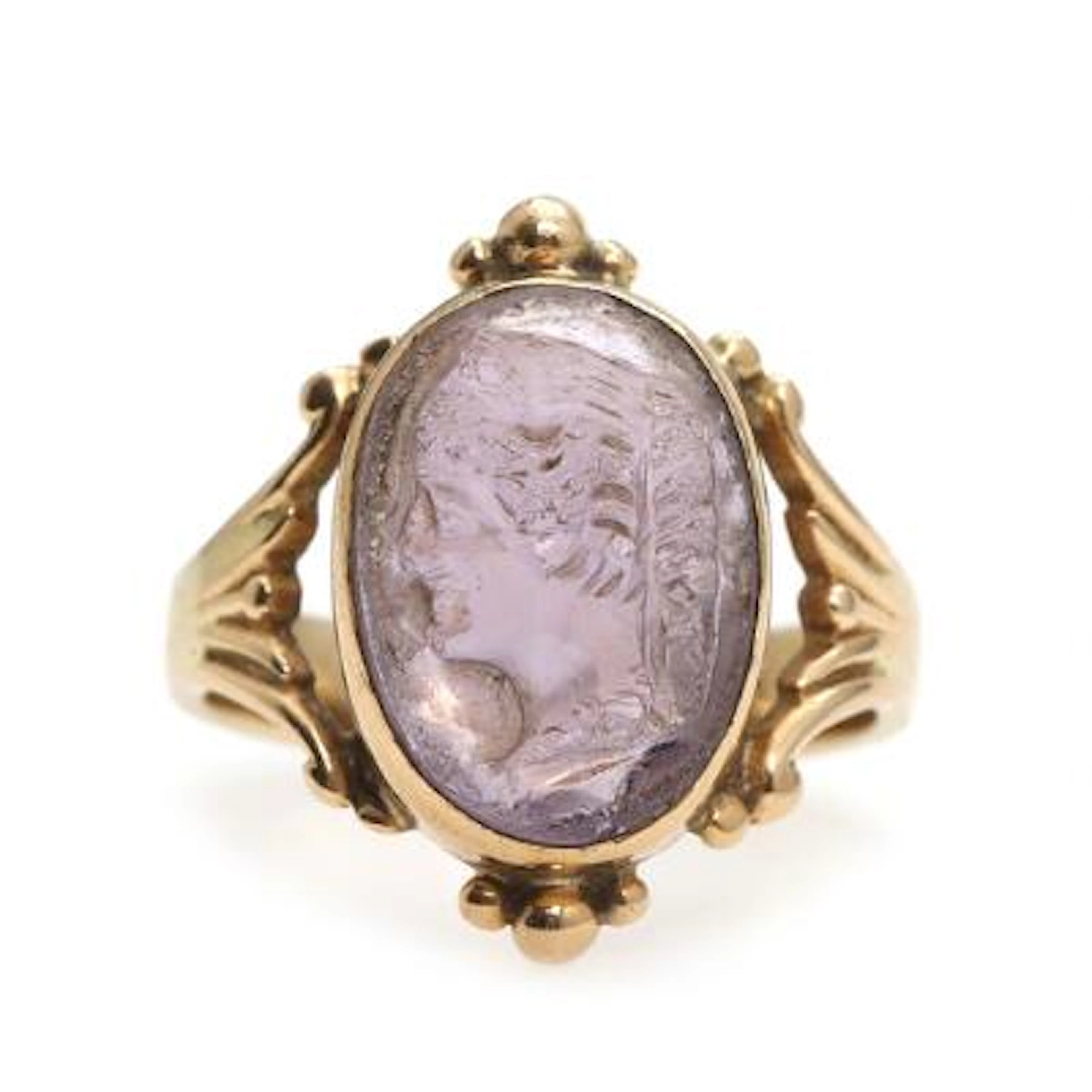 Amethyst ring set with carved amethyst, mounted in 14k gold. Size