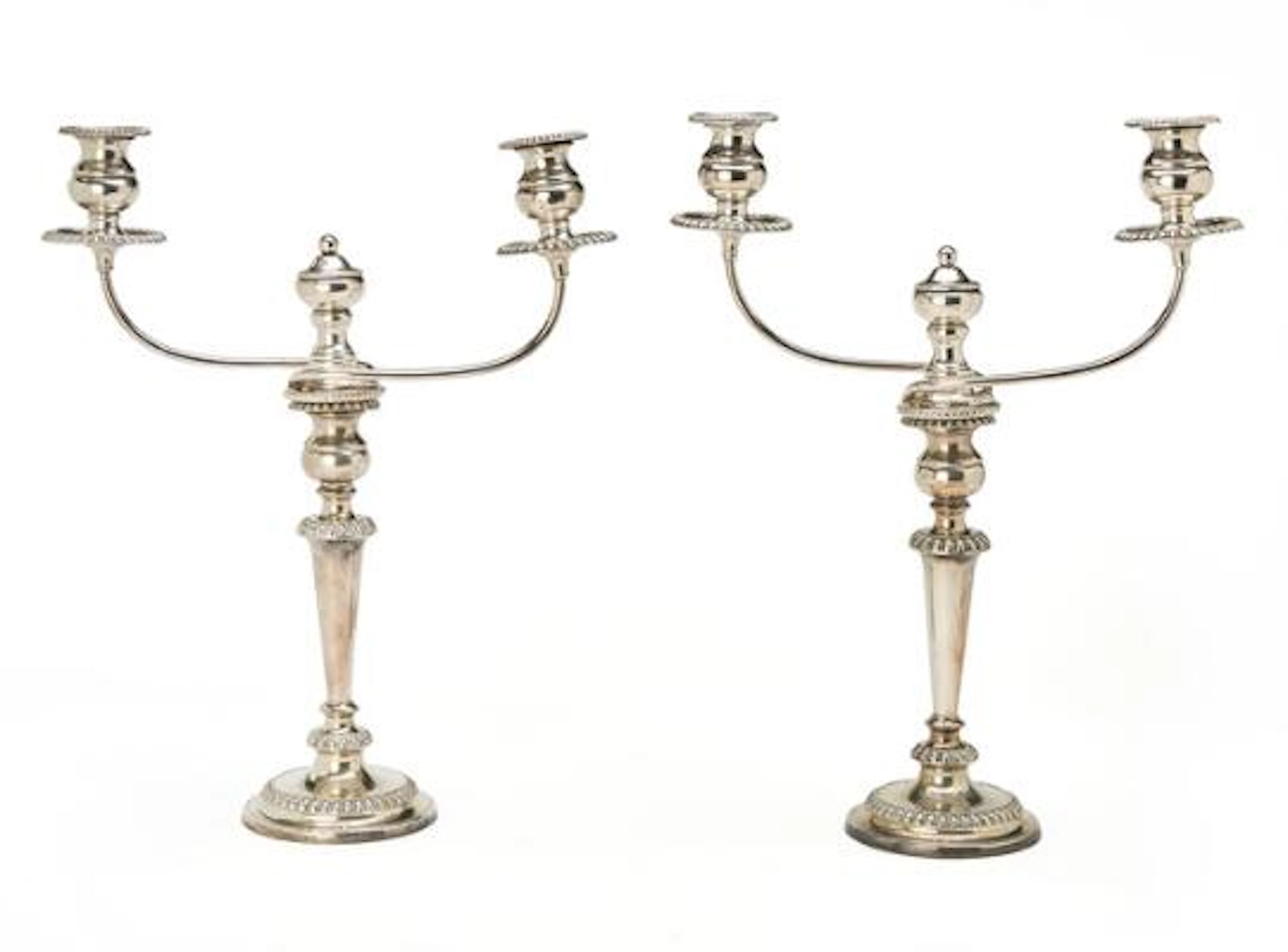 A pair of silverplated twoarmed candelabra. Filled. 20th century.