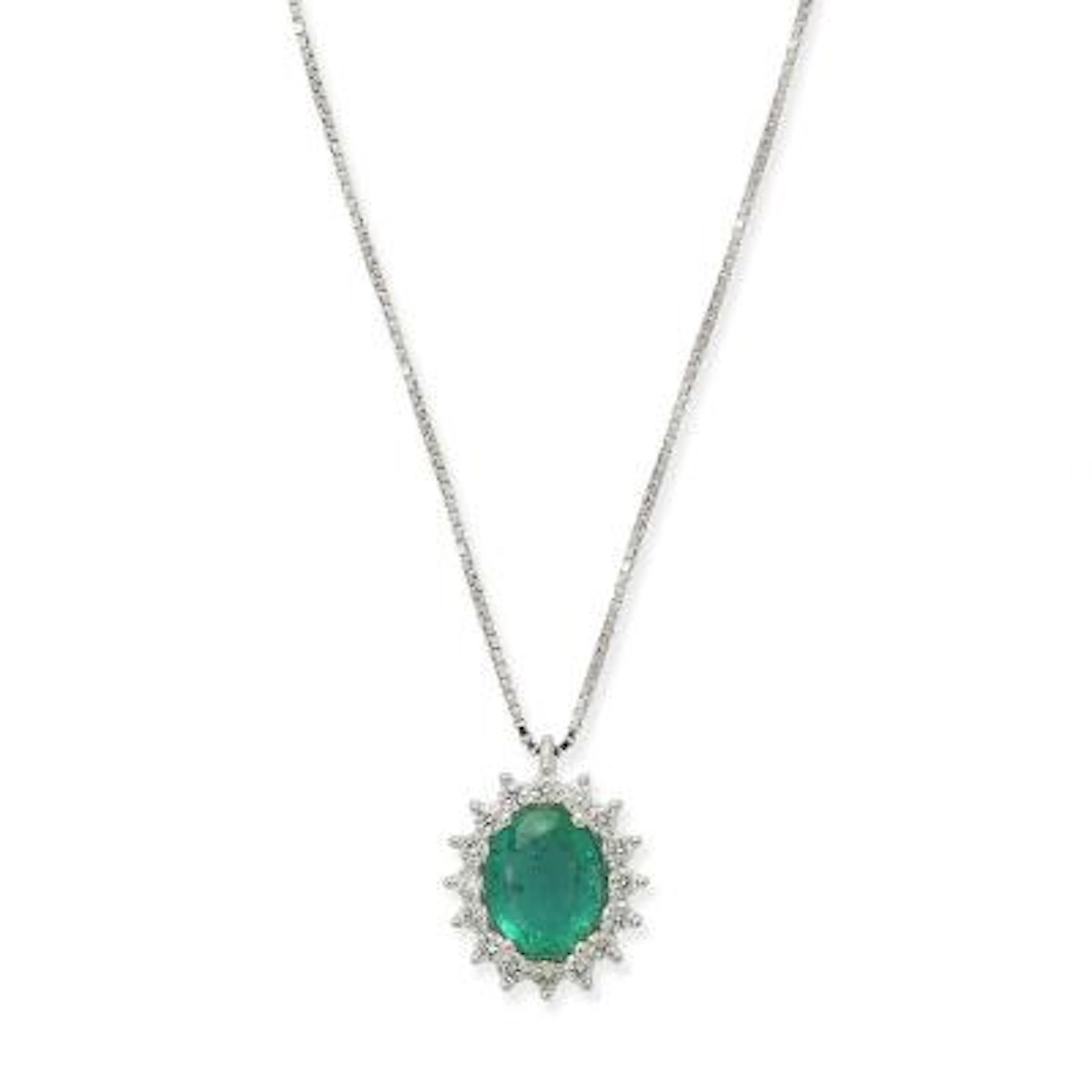 An emerald and diamond necklace set with an emerald encircled by numerous