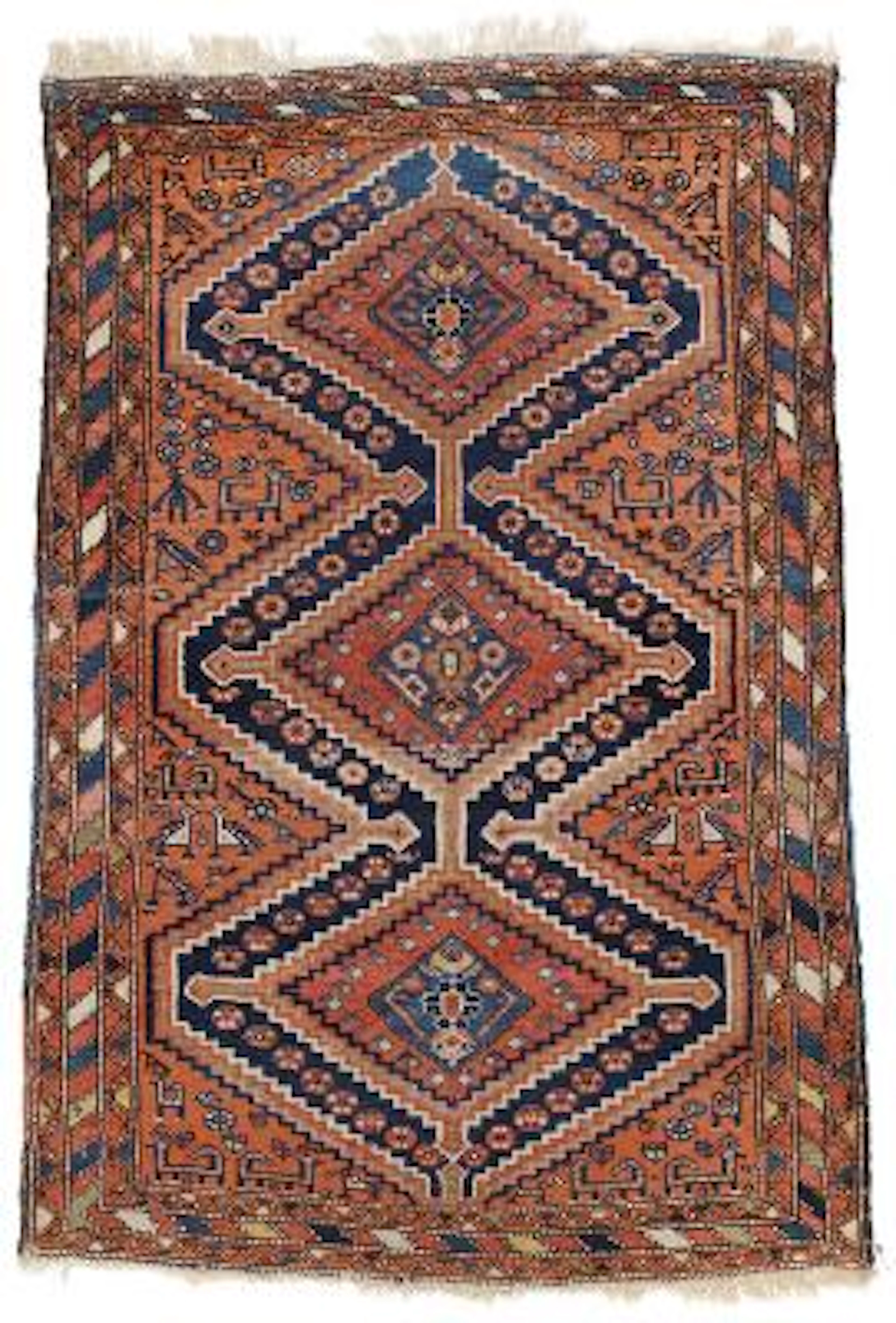 A Hamadan rug, Persia. Linked step medallion on a red field with animal