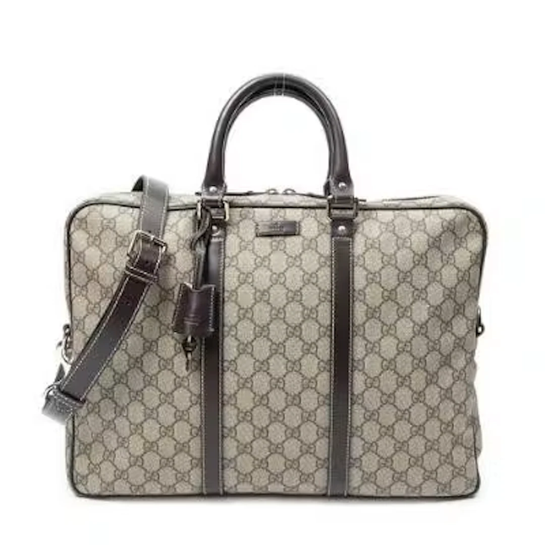 Gucci: A "GG Briefcase" in beige/brown monogram coated canvas with