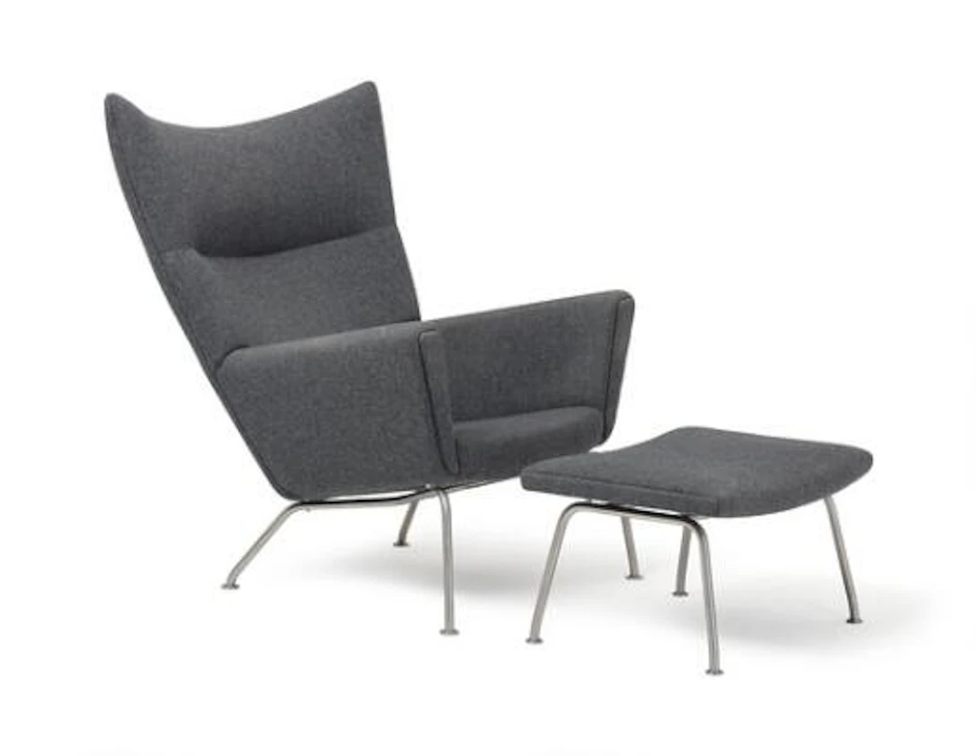 Hans J. Wegner: "Wingchair". Highback easy chair and stool upholstered