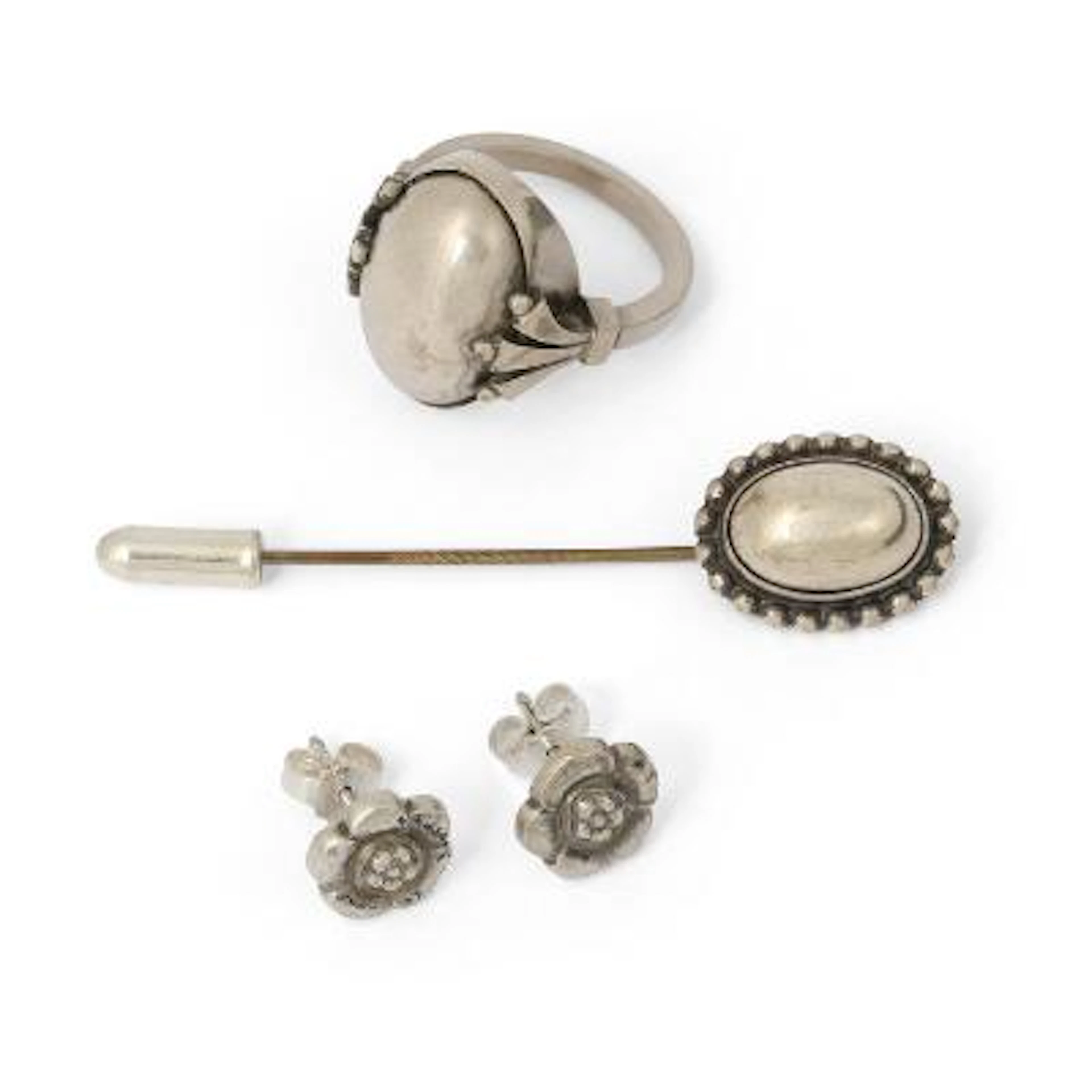Georg Jensen: A jewellery collection comprising a brooch, a pair of