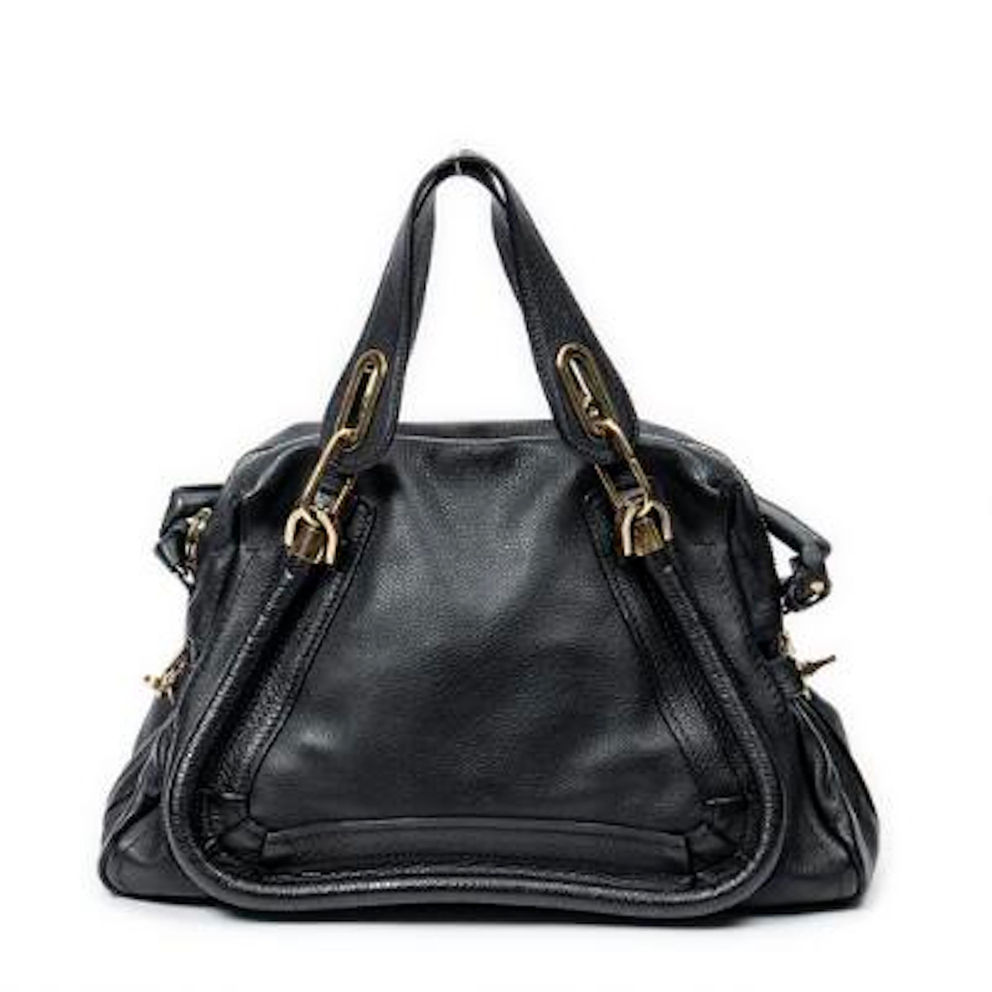 Chloé: A "Paraty" bag of black leather with gold tone hardware and