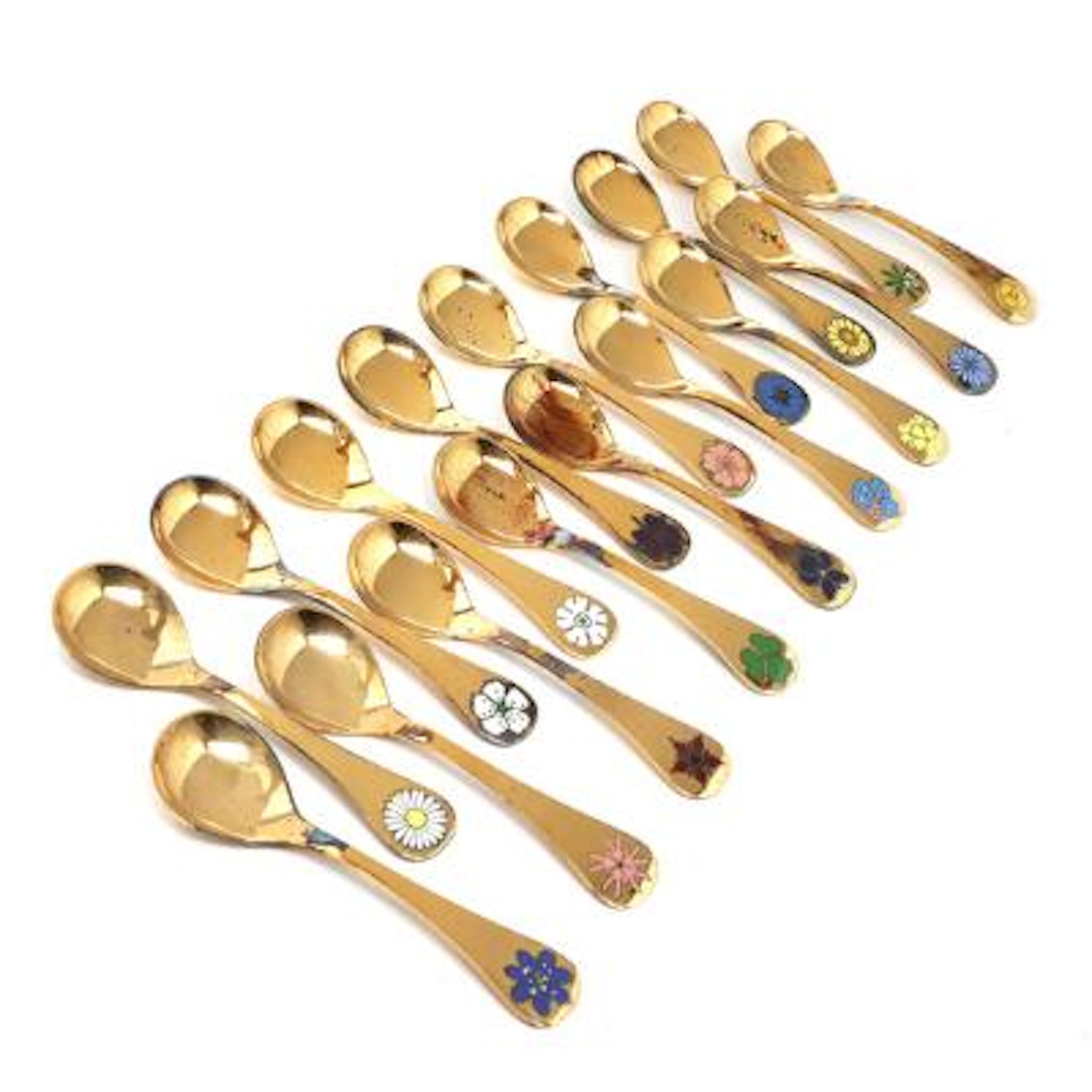 Georg Jensen: A collection of 17 gilt sterling silver annual spoons