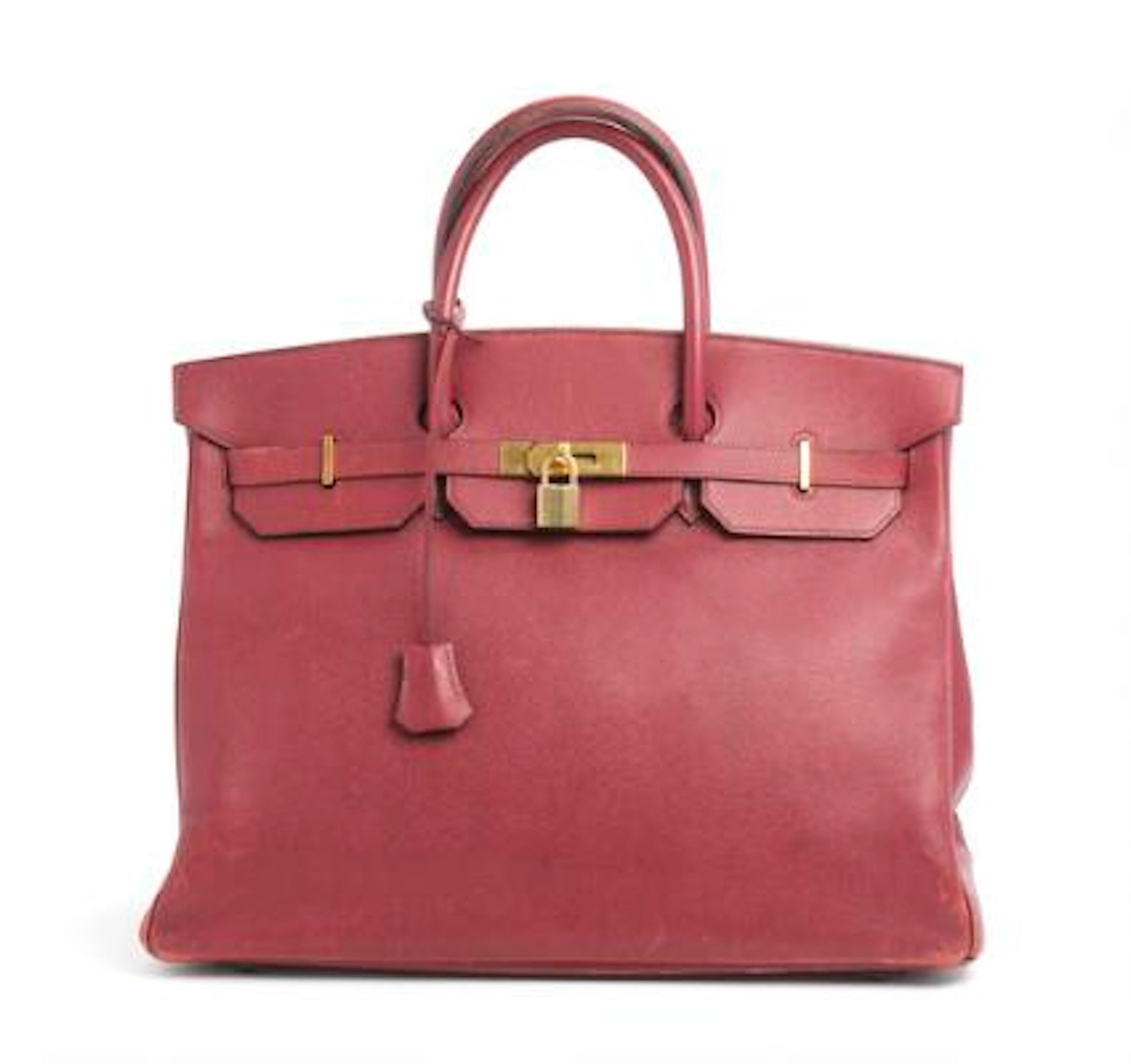 Hermès: A "Birkin 40" bag of burgundy leather with gold tone hardware