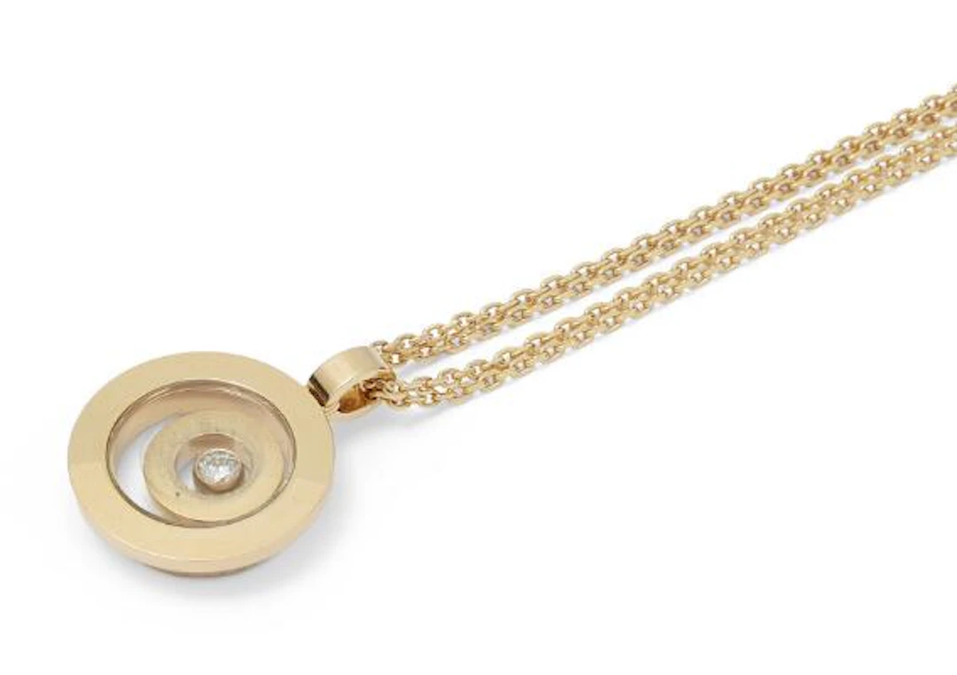 Chopard: A "Happy Spirit" diamond pendant, mounted in 18k gold. Accompanied