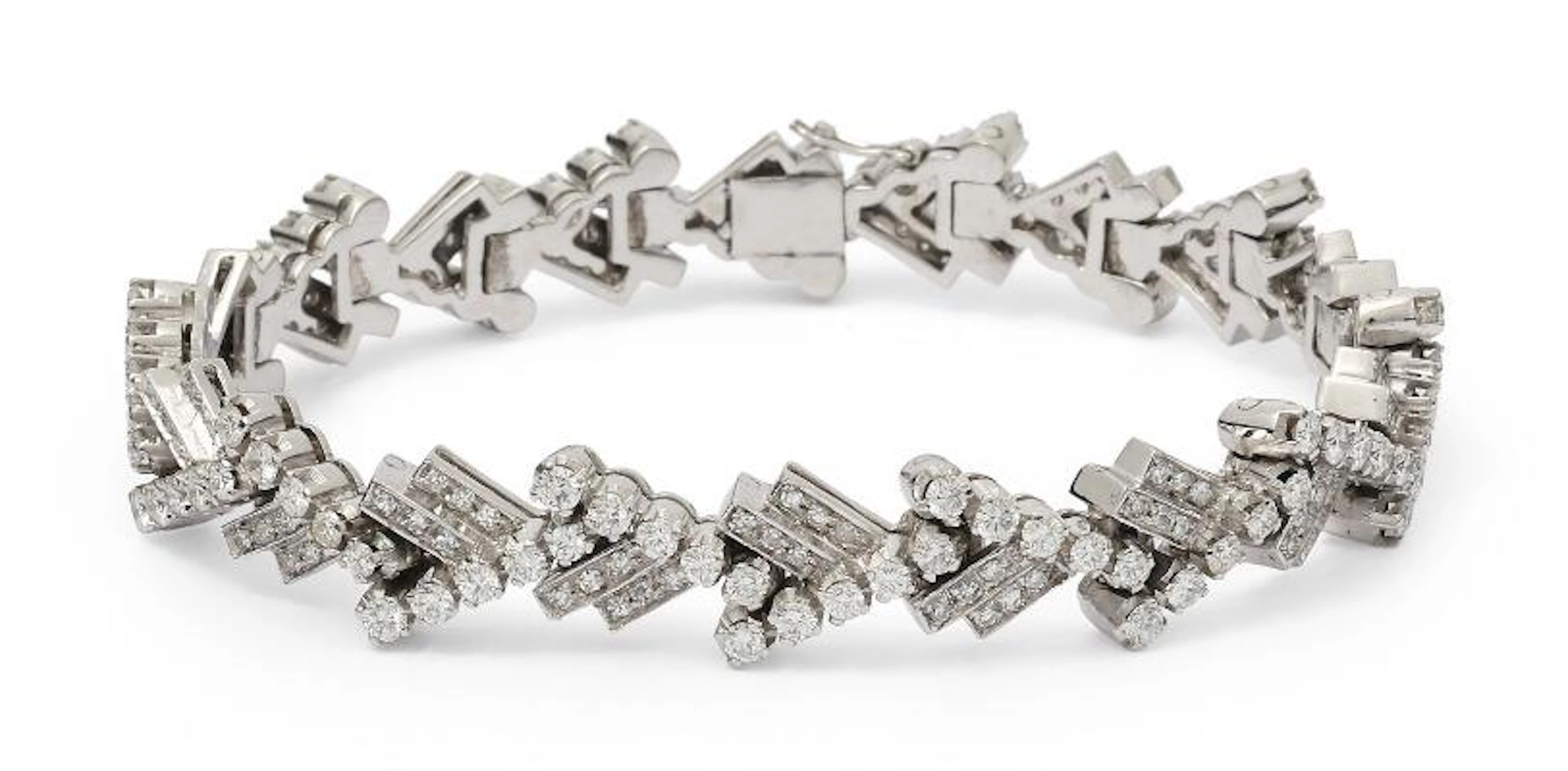 A diamond bracelet set with numerous diamonds mounted in 18k white