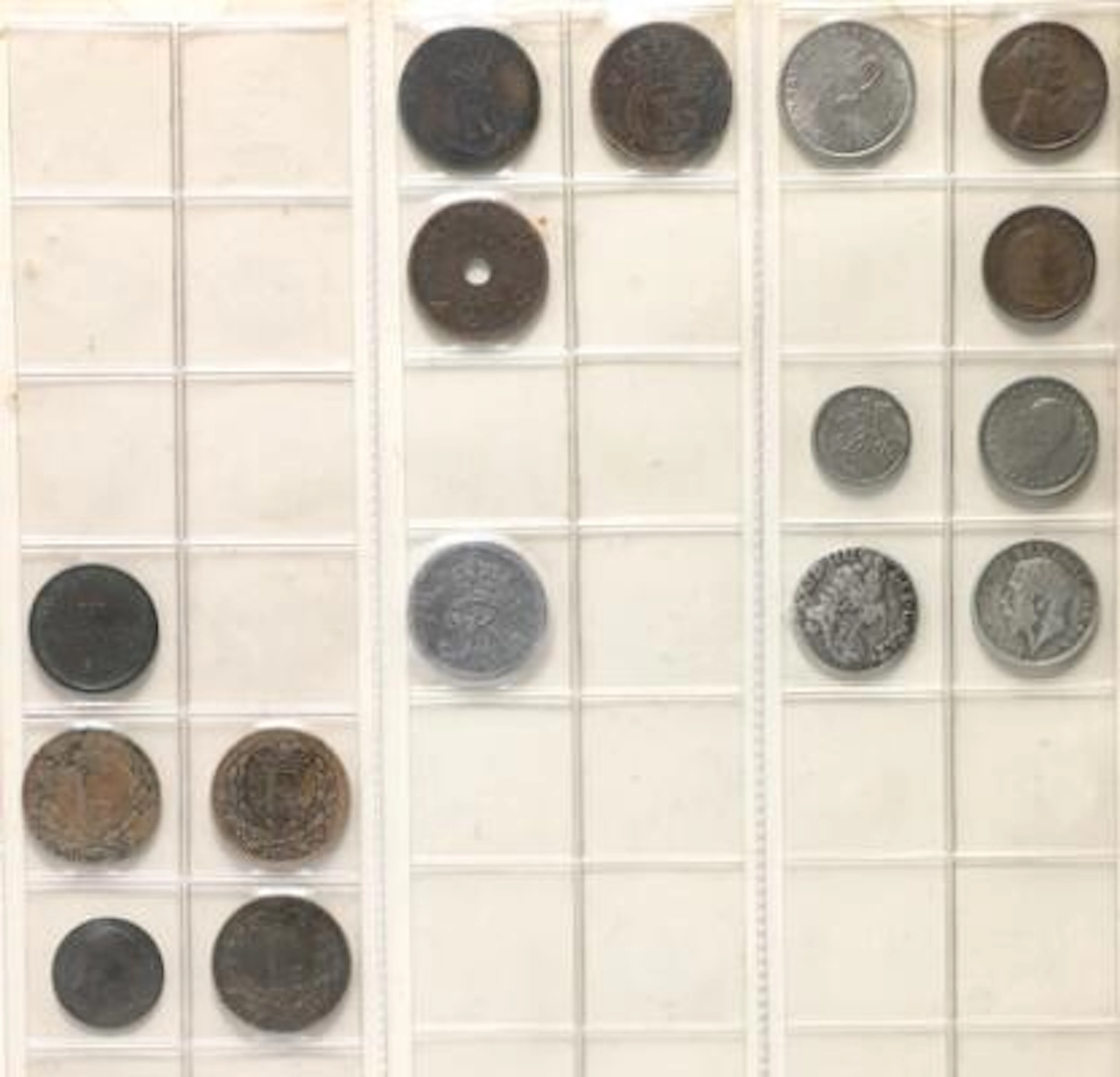 2 albums with coins from Canada, Denmark, England, France, Iceland