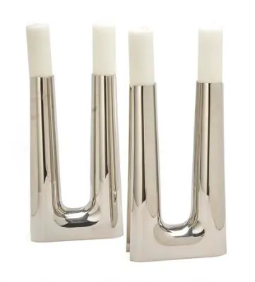 Søren Georg Jensen: A pair of large stainless steel candelabra with