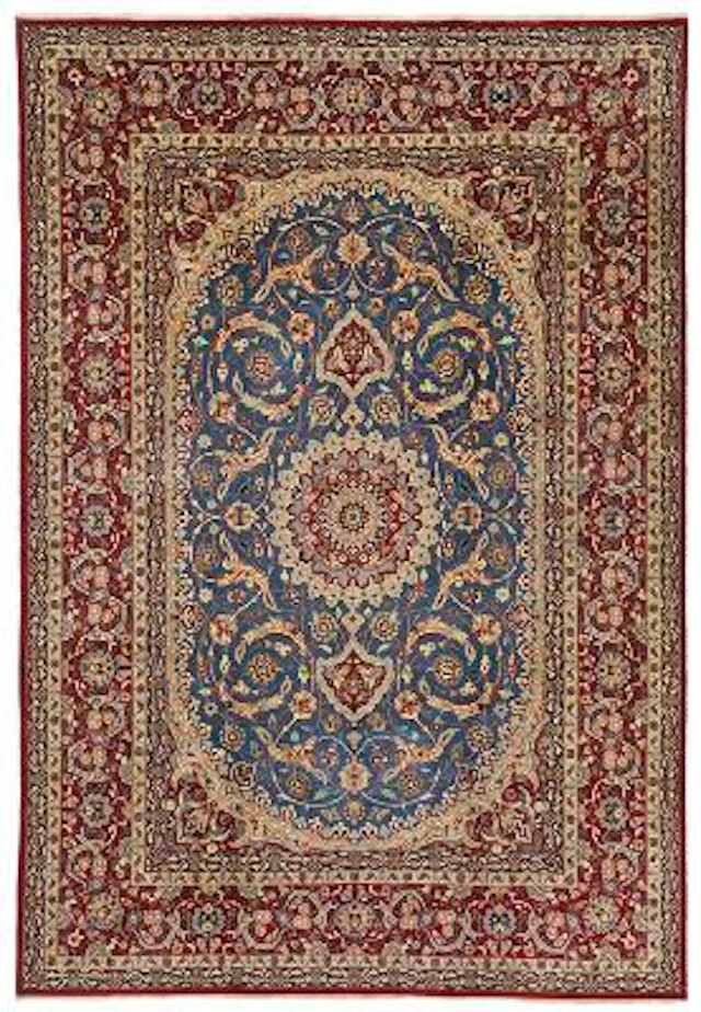 An Isfahan carpet, Persia. Medallion design on a sky blue field of