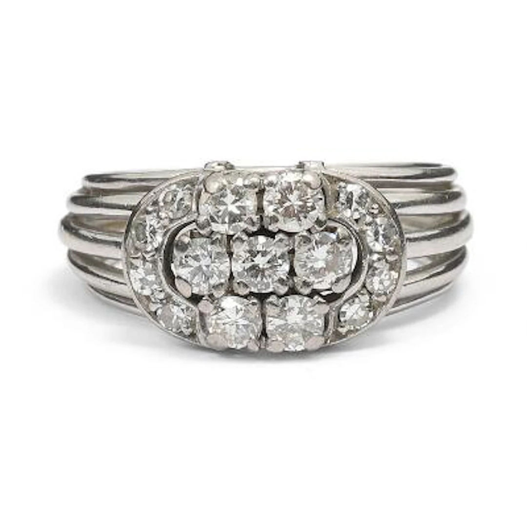 A diamond ring set with numerous diamonds, mounted in 14k white gold.