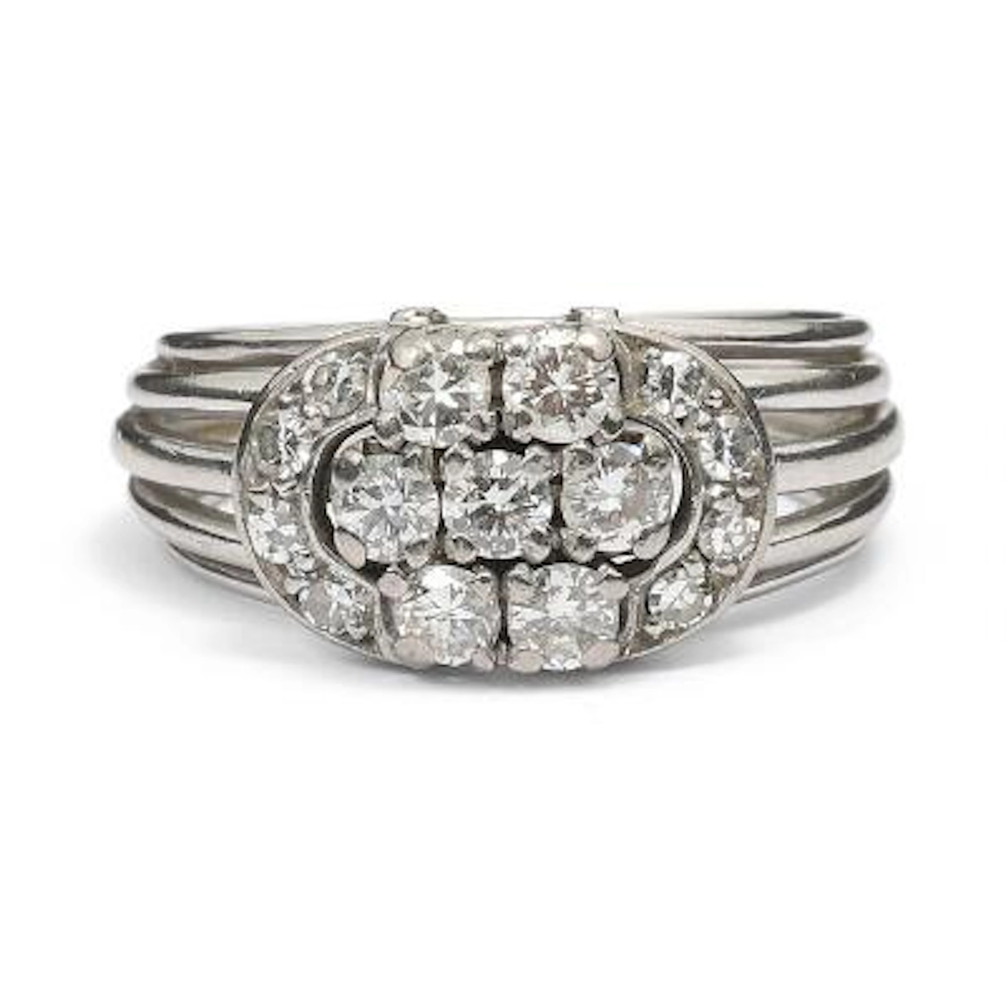 A diamond ring set with numerous diamonds, mounted in 14k white gold.