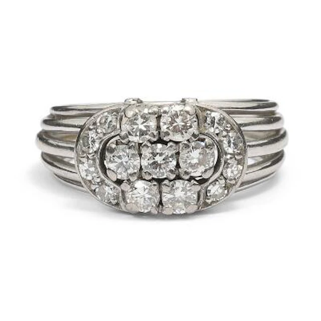 A diamond ring set with numerous diamonds, mounted in 14k white gold.