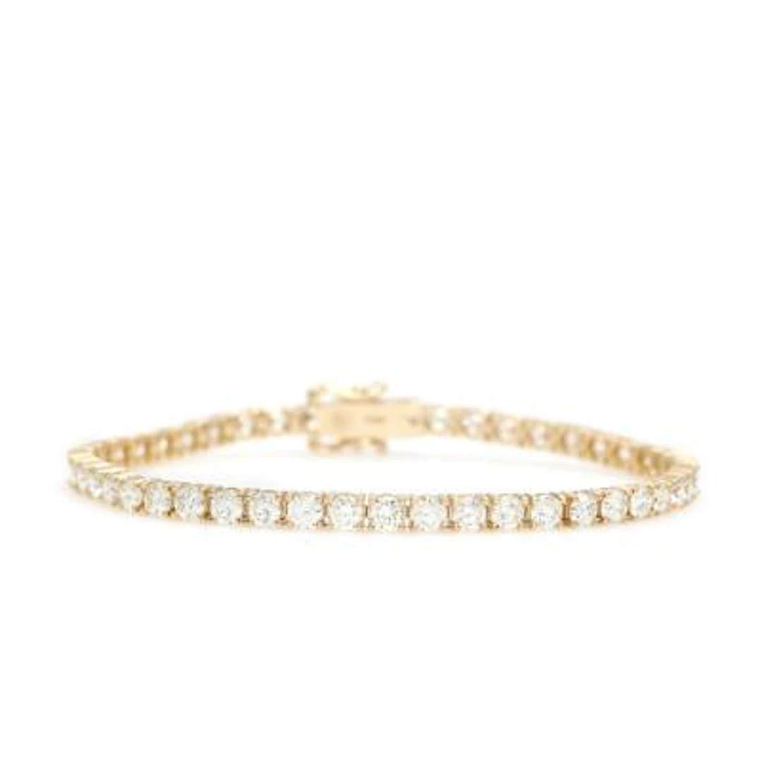 A diamond tennis bracelet set with 47 brilliant-cut diamonds, mounted