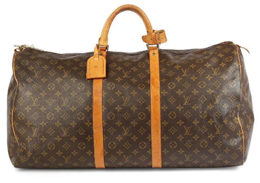 Louis Vuitton: A "Keepall 60" travel bag of brown monogram coated