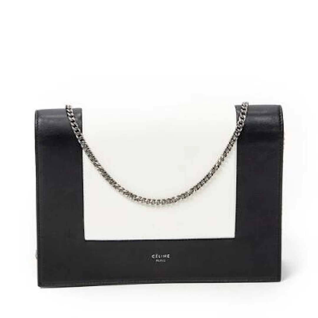 Céline: "Frame Evening Clutch" in black and white leather with a chain