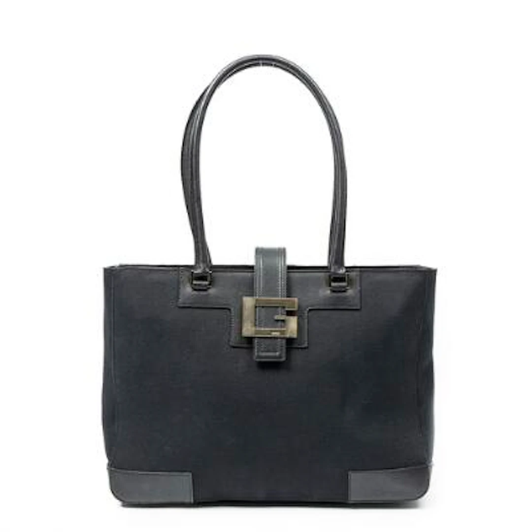 Gucci: A "G Buckle Logo Open Tote" of black canvas with black leather